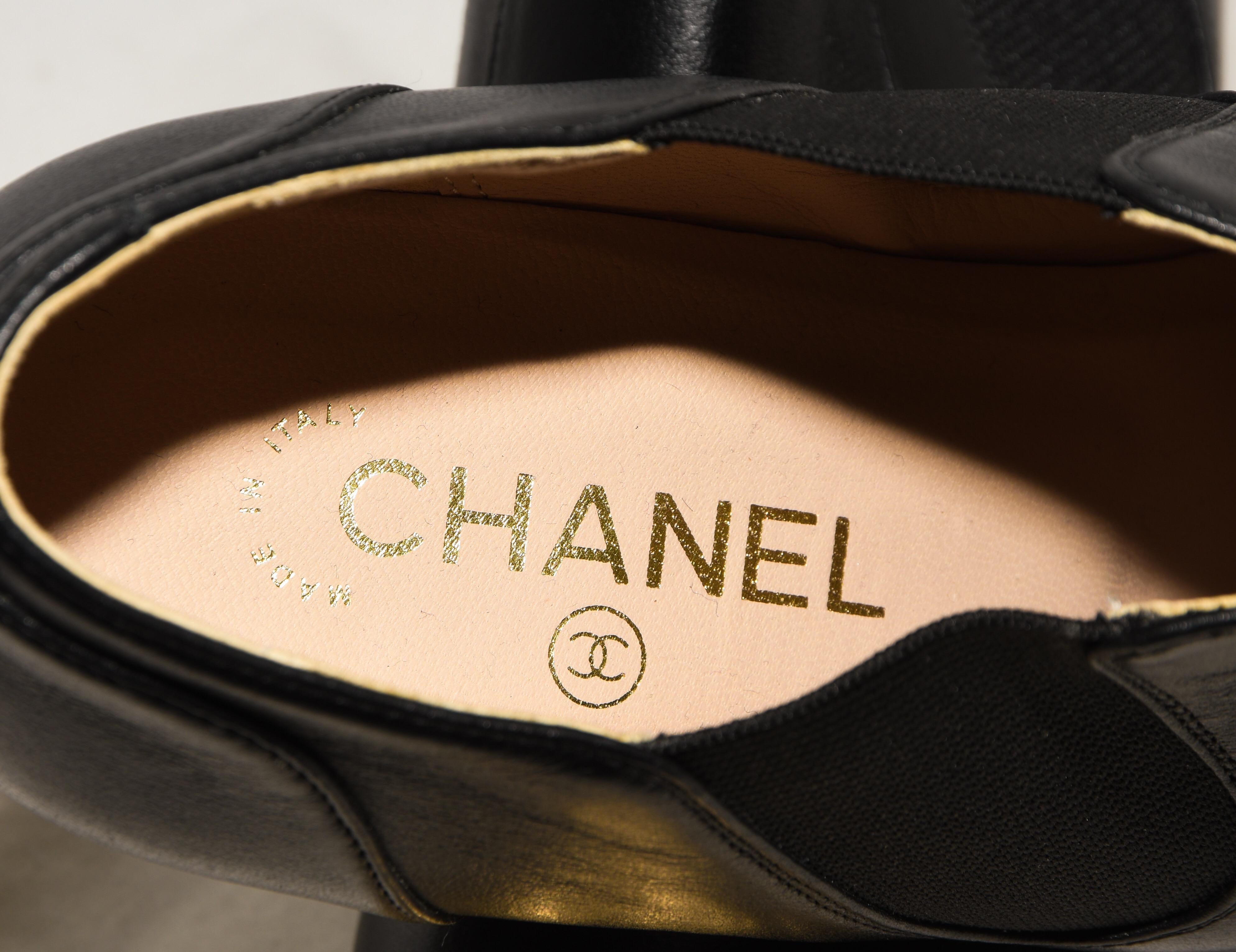 Chanel Black Paris to Dallas Ankle Booties Gold Tone Cap & Sheriff's Badges Heel In Excellent Condition For Sale In Palm Beach, FL
