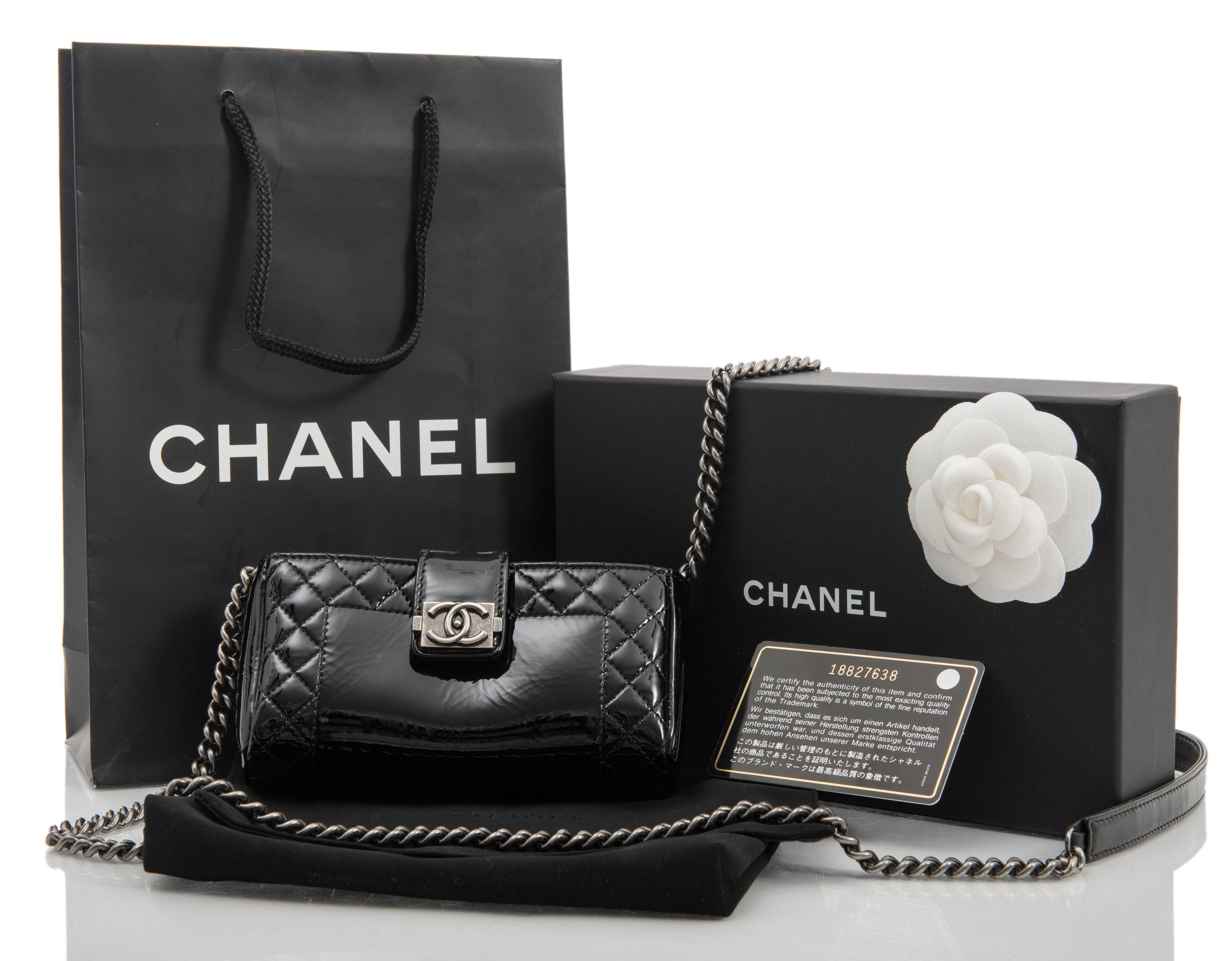 Chanel Black Patent Boy Reverso Quilt Mini Pochette Crossbody Bag.  Can be used as a mini evening bag to hold cards, cash, key, and lipstick. Fit for an iphone 6 / 7 is very tight. Original retail $1575.  Black patent leather body with dark
