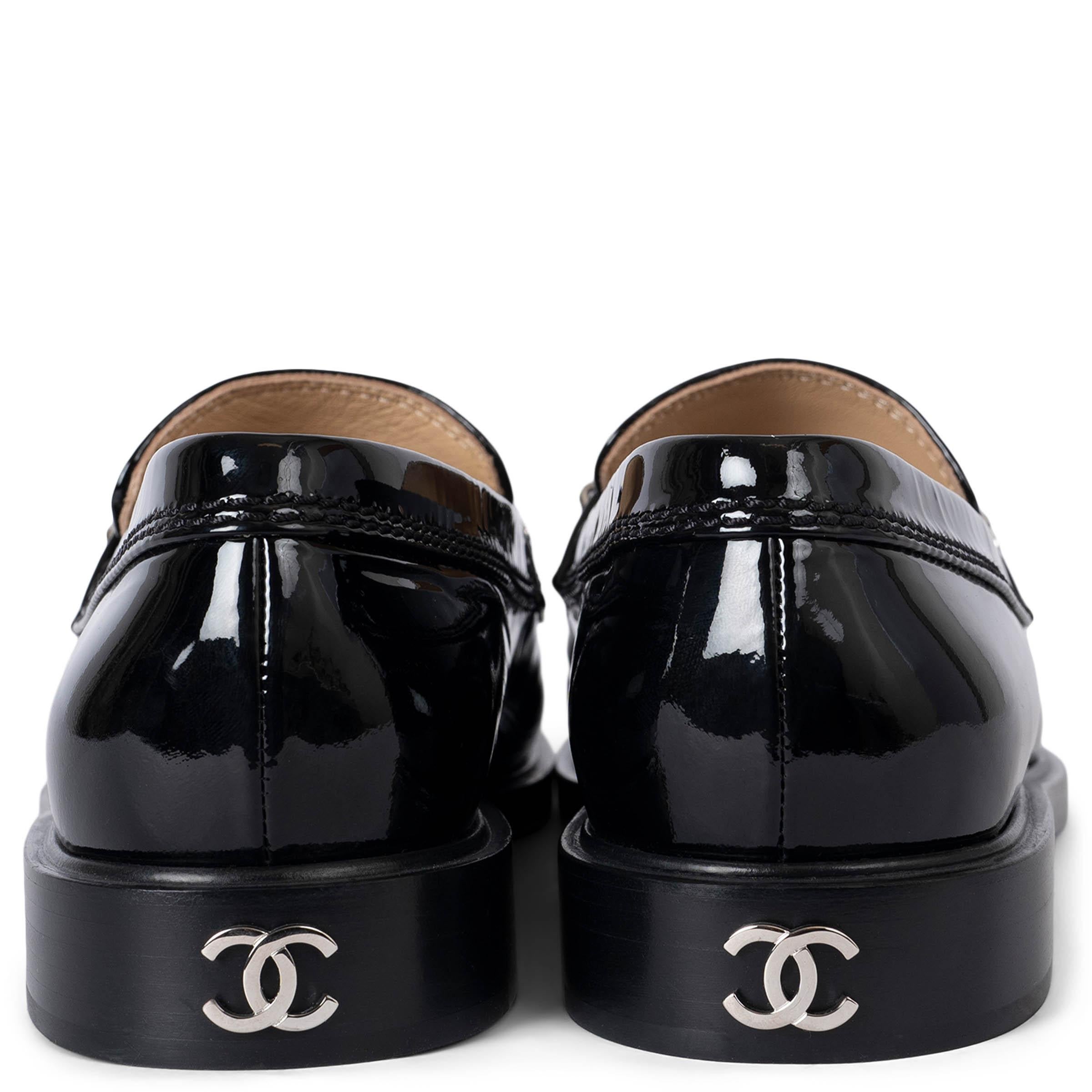 Women's CHANEL black patent leather 23A DAKAR LOGO PENNY Loafers Shoes 38.5 For Sale