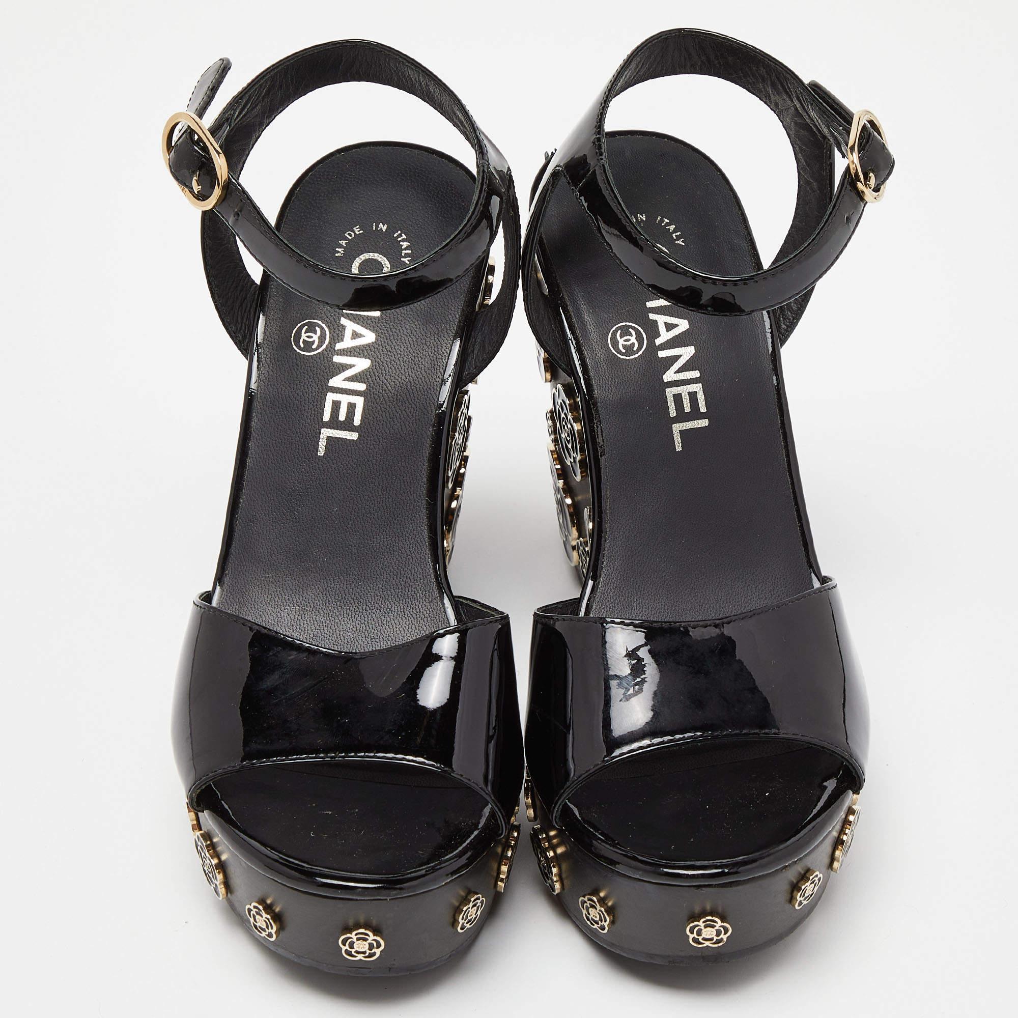 Deliver statement looks with these sandals from Chanel! From their shape and detailing to their overall appeal, they exude sophisticated style. The sandals come crafted from leather and have camelia motifs on the wedge heels.

