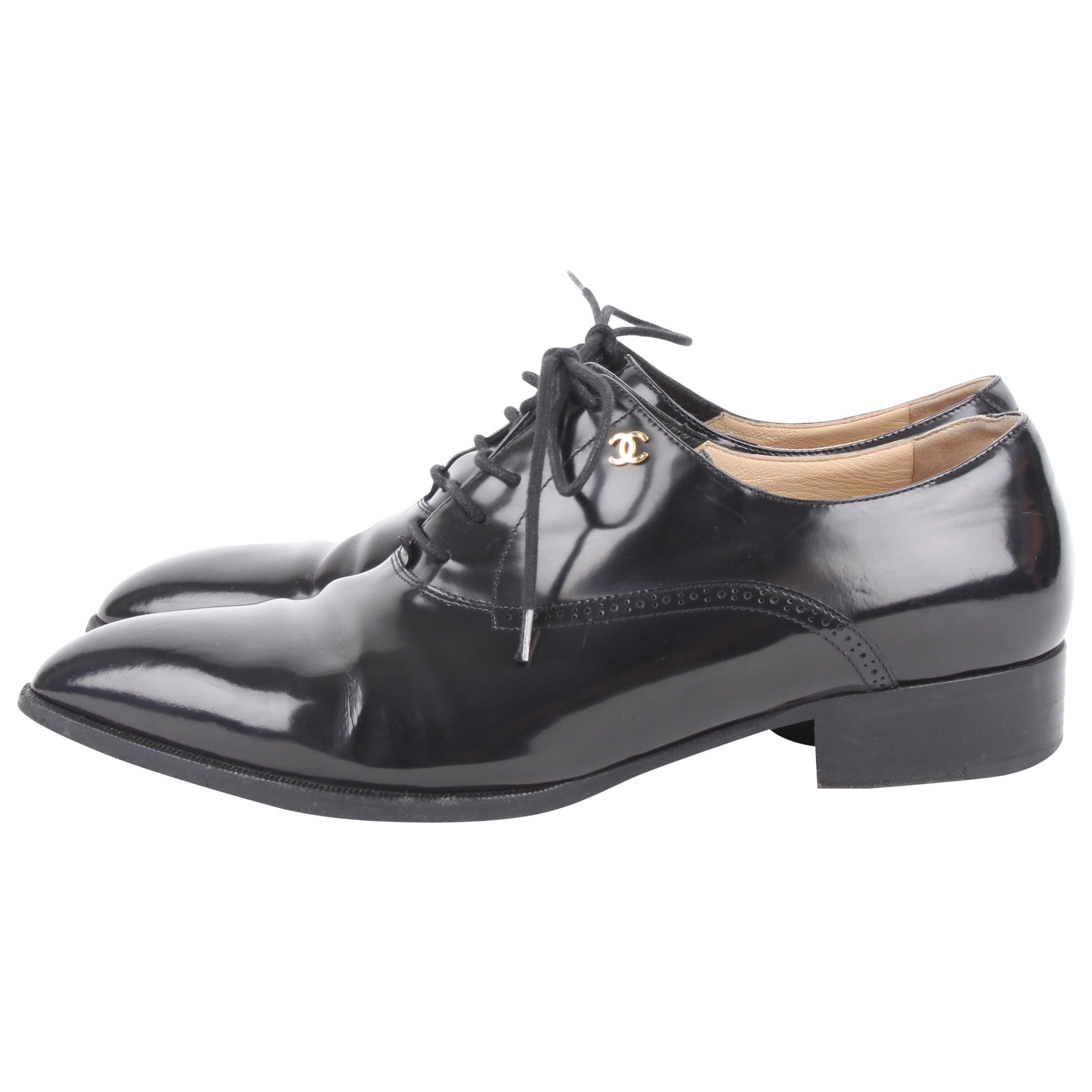Chanel black patent leather CC logo pointed-toe loafers For Sale