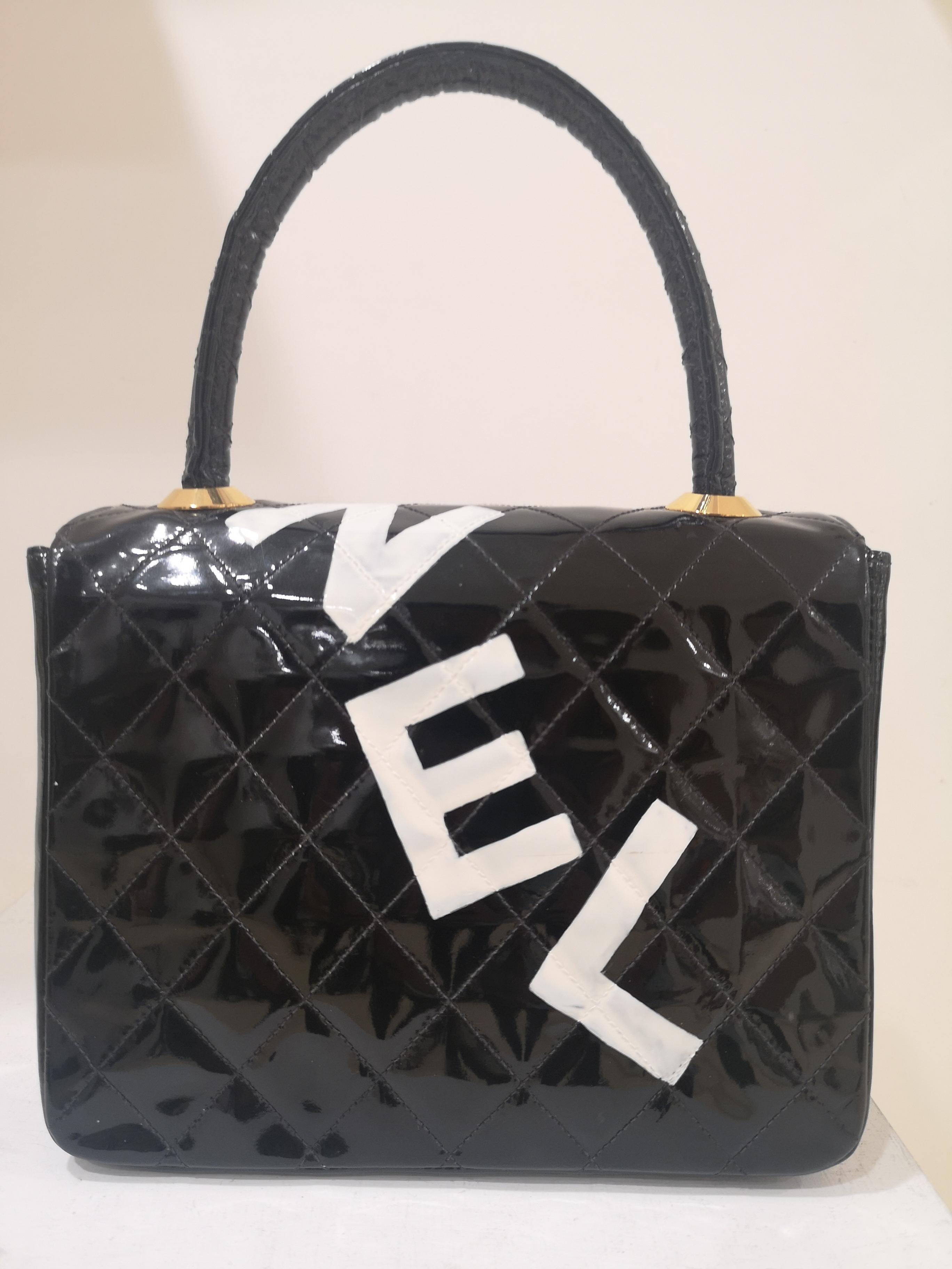 Black Chanel black patent leather handbag 
