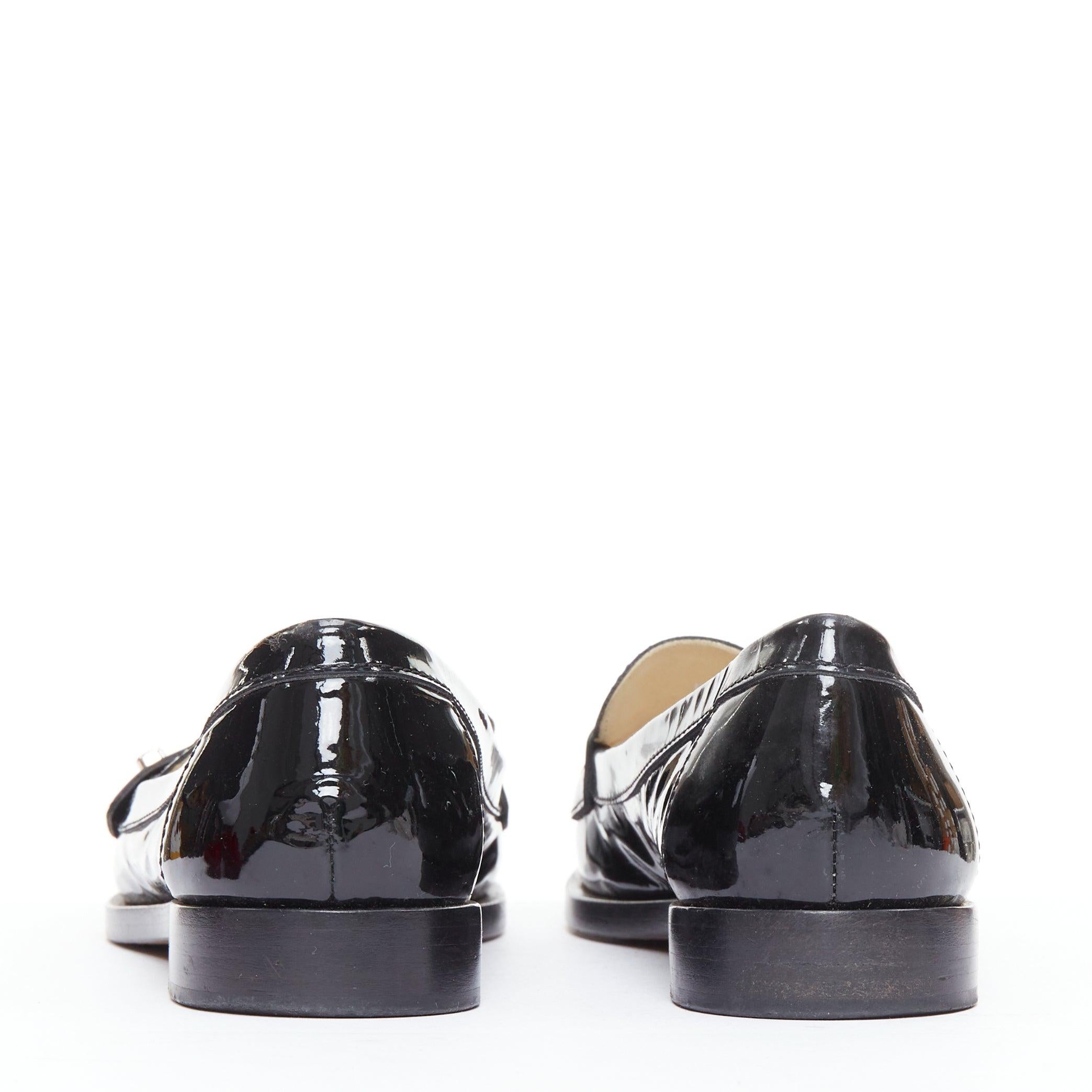 Chanel mocassins en cuir verni noir avec logo CC imbriqué EU36.5 Pour femmes en vente