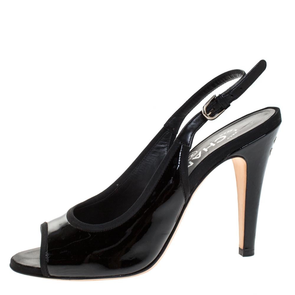 This classic and timeless pair of slingback sandals from Chanel is essential in every woman’s collection. Constructed in patent leather, these peep-toe sandals feature platforms and 10 cm heels to lift you in an elegant manner.

Includes: Original