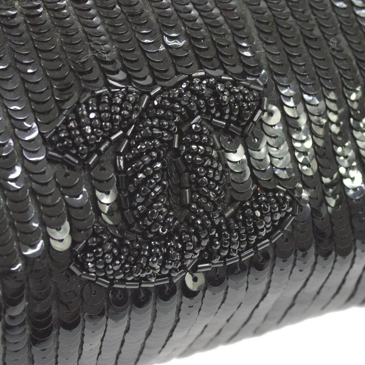 Chanel Black Patent Leather Sequin Bead Mini Small Baguette Clutch Evening Bag

Patent leather
Bead
Sequin
Leather lining
Zipper closure
Measures 6.75
