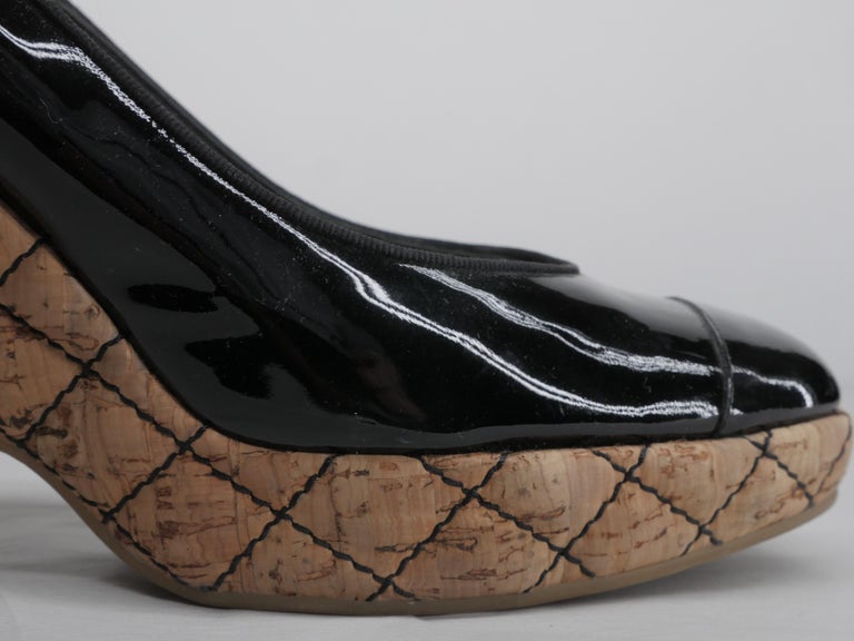 black patent wedges