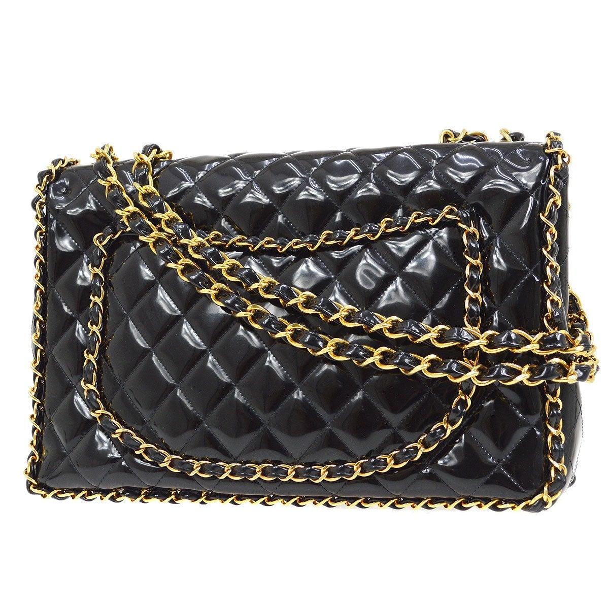 CHANEL Black Patent Leather Wrap Chain Gold Maxi Evening Shoulder Flap Bag In Good Condition For Sale In Chicago, IL