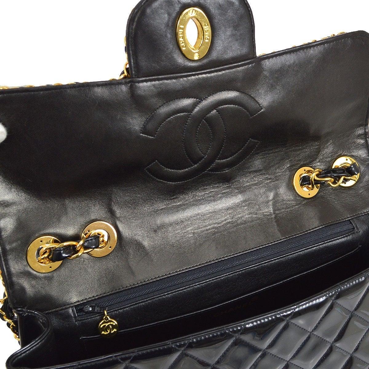 Women's CHANEL Black Patent Leather Wrap Chain Gold Maxi Evening Shoulder Flap Bag For Sale