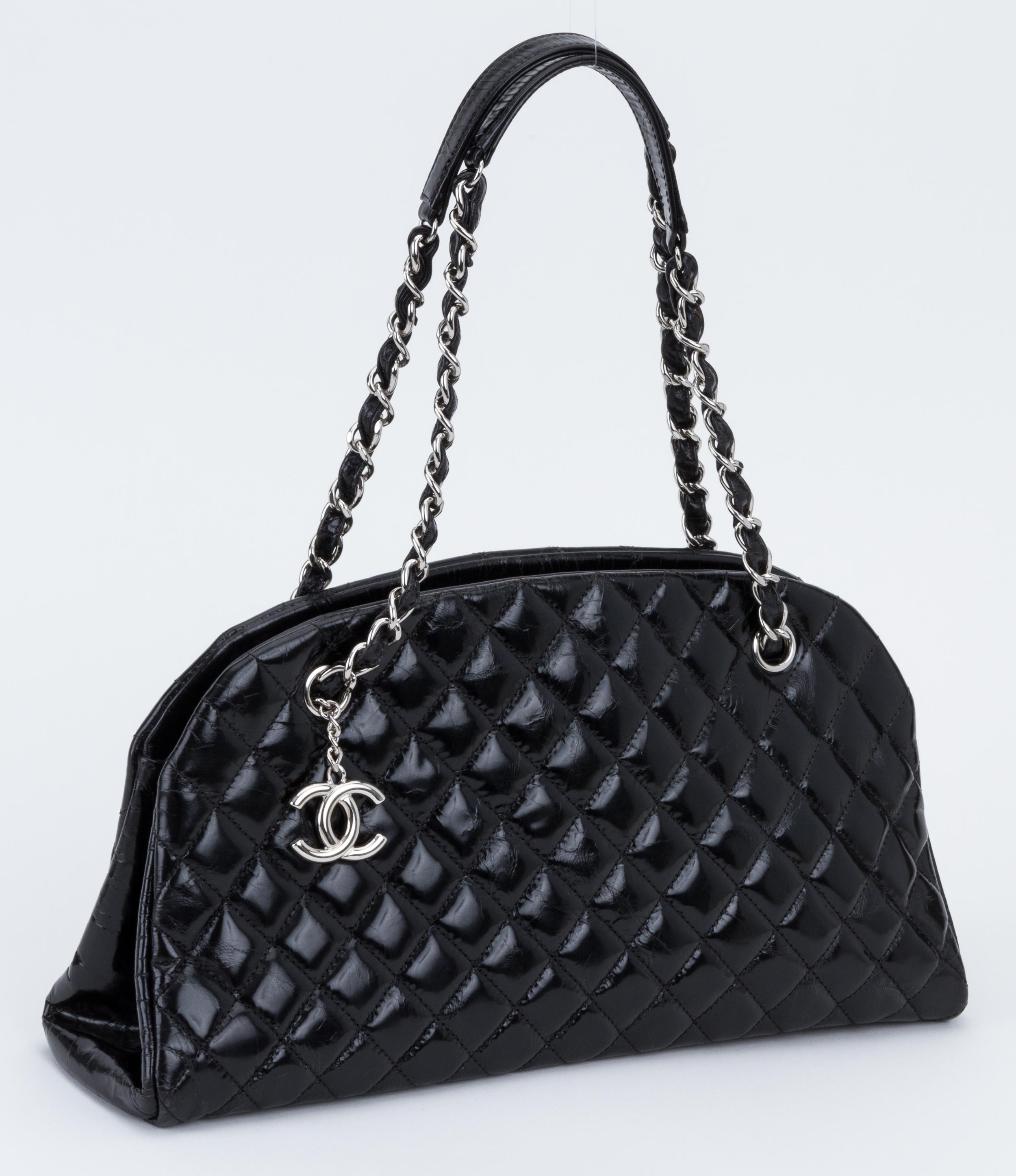 Chanel quilted black distressed patent leather mademoiselle bag with silver hardware. Shoulder drop 9
