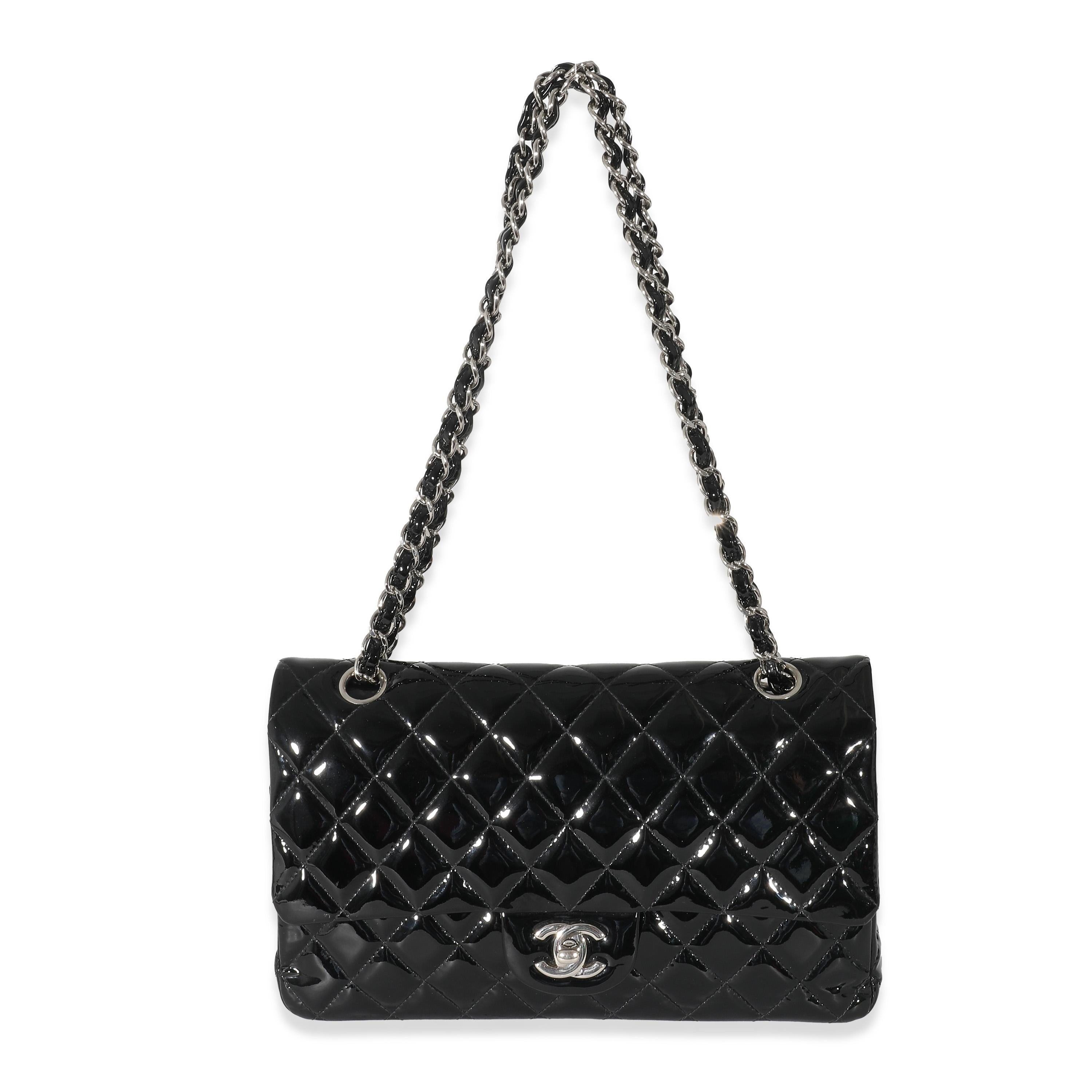 Listing Title: Chanel Black Patent Medium Classic Double Flap Bag
SKU: 133982
Condition: Pre-owned 
Handbag Condition: Very Good
Condition Comments: Item is in very good condition with minor signs of wear. Exterior light scuffing and marks.