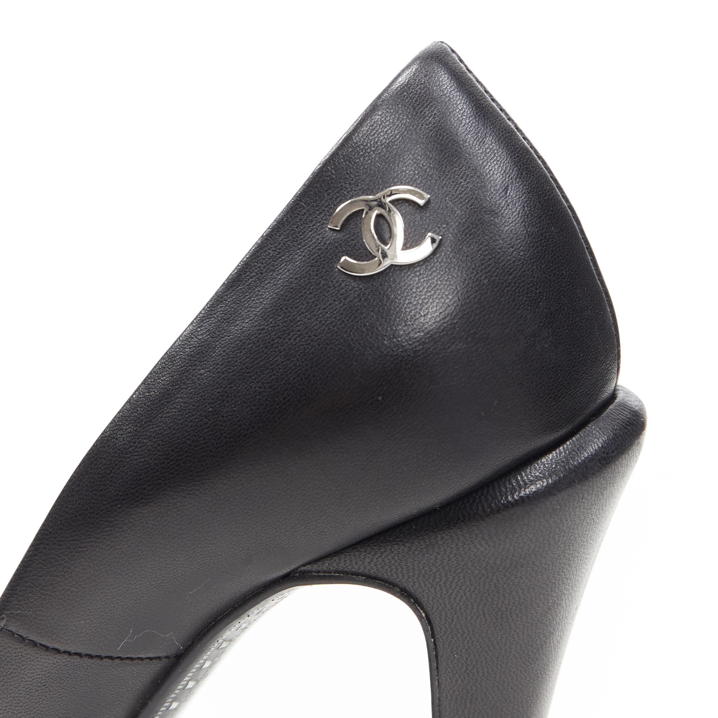 CHANEL black patent toe cap sculpted heel CC logo leather platform pump EU36
Brand: Chanel
Designer: Karl Lagerfeld
Model Name / Style: Platform pumo
Material: Leather
Color: Black
Pattern: Solid
Extra Detail: Calf leather heel. Patent toe cap.