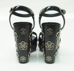 CHANEL Black Patent Wedge with Metal Camellias - 37.5