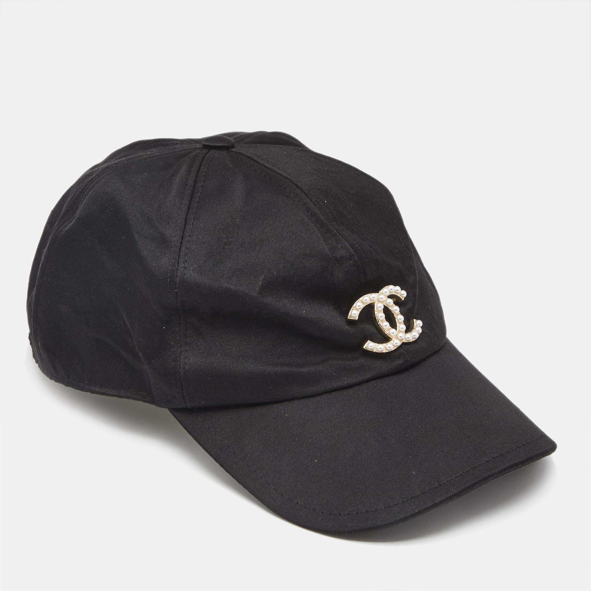 The Chanel cap is a stylish accessory that combines luxury and comfort. Crafted from premium silk it features the iconic CC logo elegantly embroidered on the front. The cap showcases a chic black hue making it a versatile addition to any outfit.
