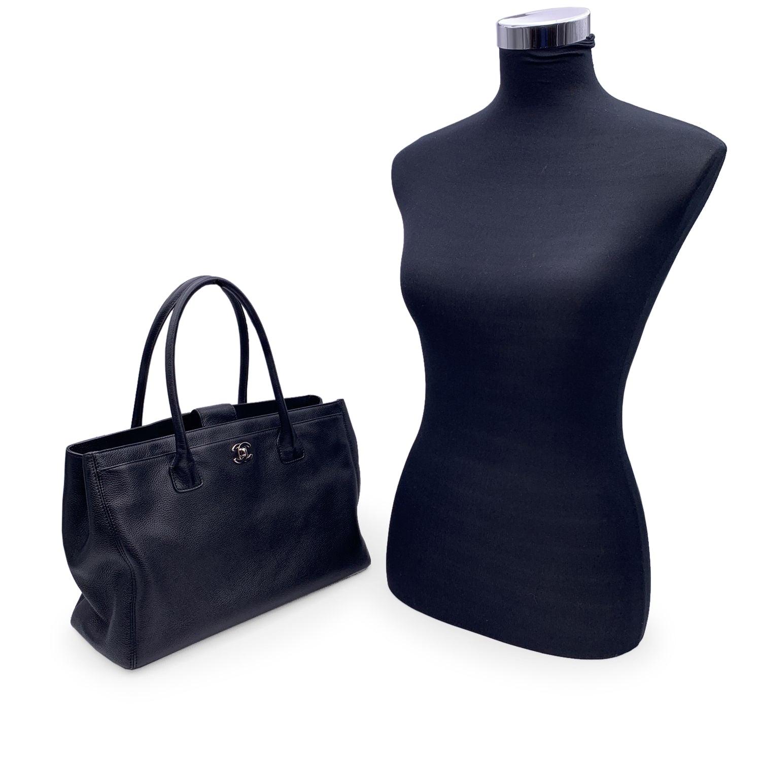 This beautiful Bag will come with a Certificate of Authenticity provided by Entrupy. The certificate will be provided at no further cost. Entrupy for this item at no further cost. Stunning Chanel 'Executive' Tote Bag in black pebbled leather.