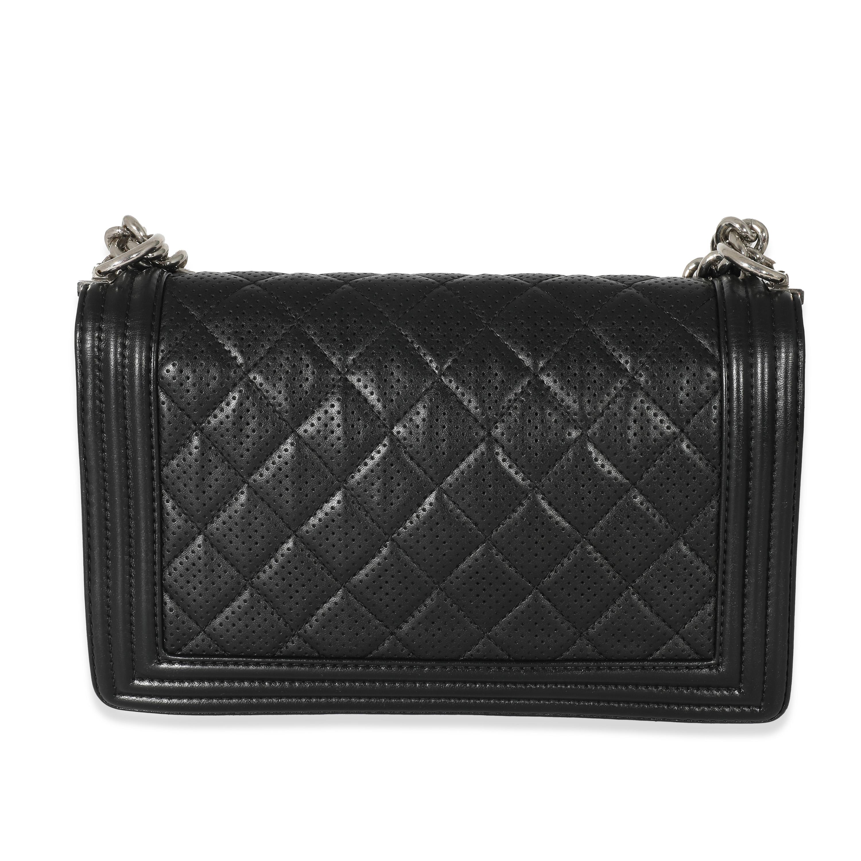 Listing Title: Chanel Black Perforated Lambskin New Medium Boy Bag
SKU: 133458
Condition: Pre-owned 
Condition Description: An instant classic, the Boy bag from Chanel was introduced in 2011. The quilted bag was designed by the late Karl Lagerfeld,