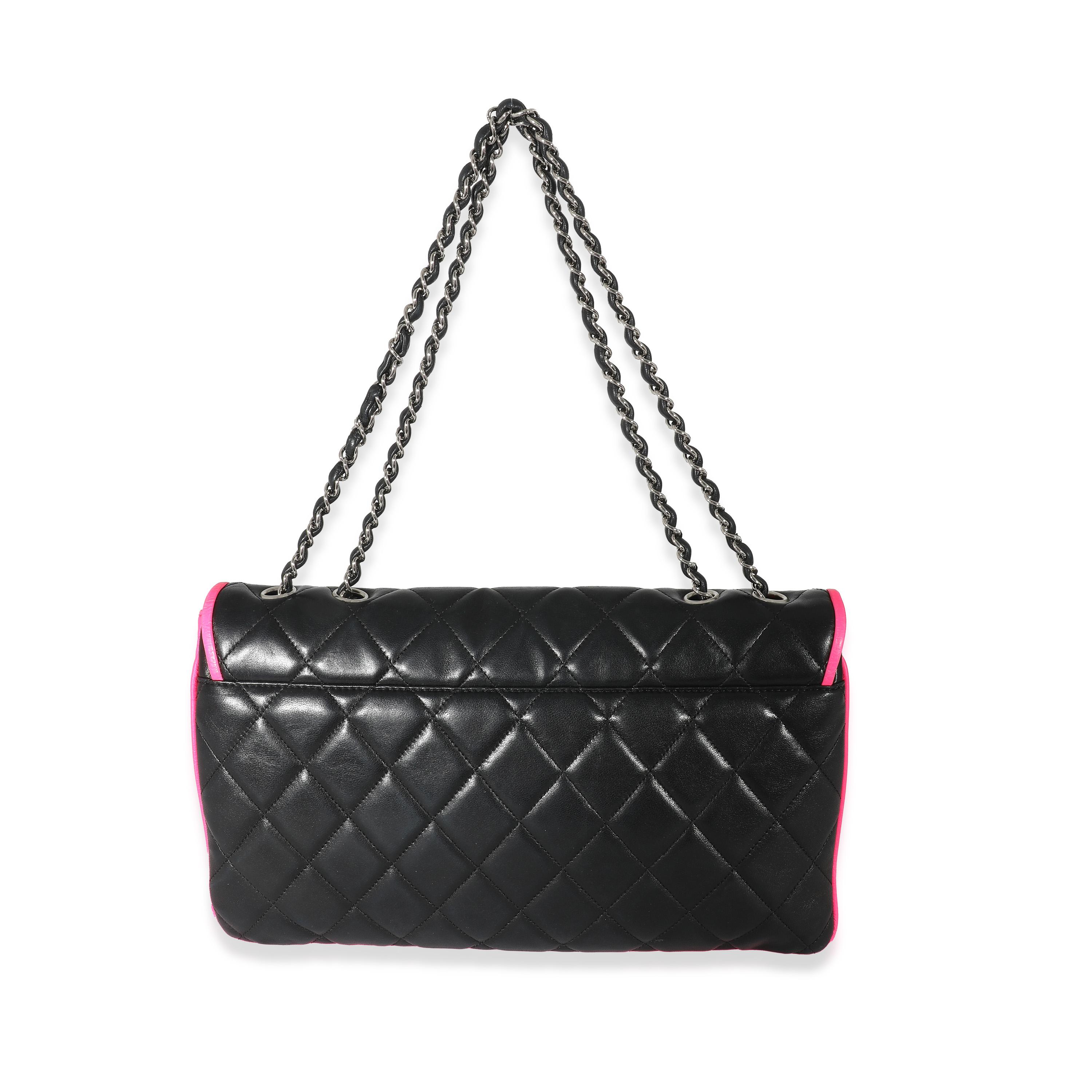 Listing Title: Chanel Black Pink Lambskin Enamel Large Maxi Divine Flap Bag
SKU: 133872
Condition: Pre-owned 
Handbag Condition: Very Good
Condition Comments: Item is in very good condition with minor signs of wear. Exterior heavy scuffing