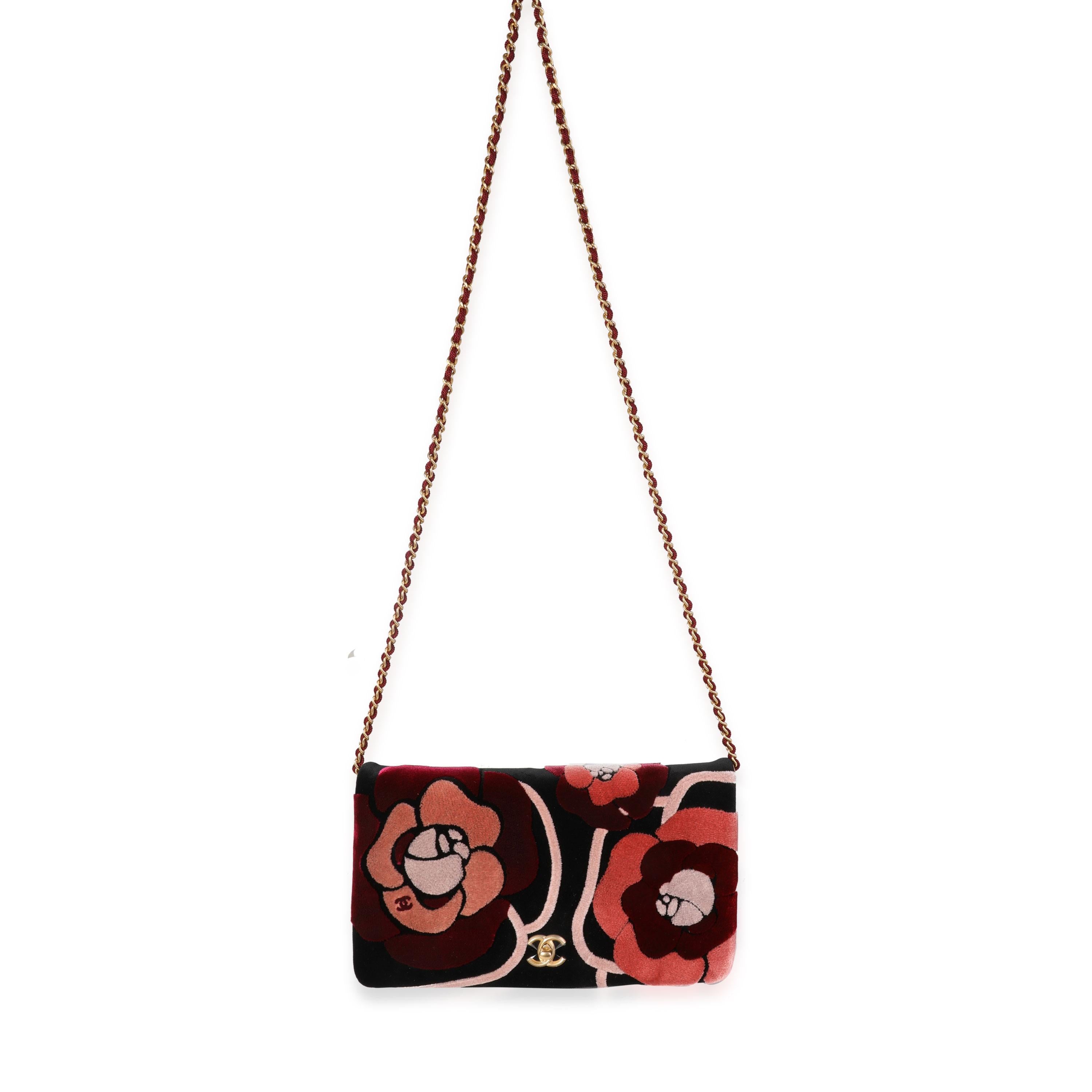 Listing Title: Chanel Black, Pink, & Red Velvet Camellia Clutch with Chain
SKU: 120216
MSRP: 3200.00
Condition: Pre-owned (3000)
Handbag Condition: Mint
Condition Comments: Mint Condition. Plastic on hardware. Small press mark to inner flap from