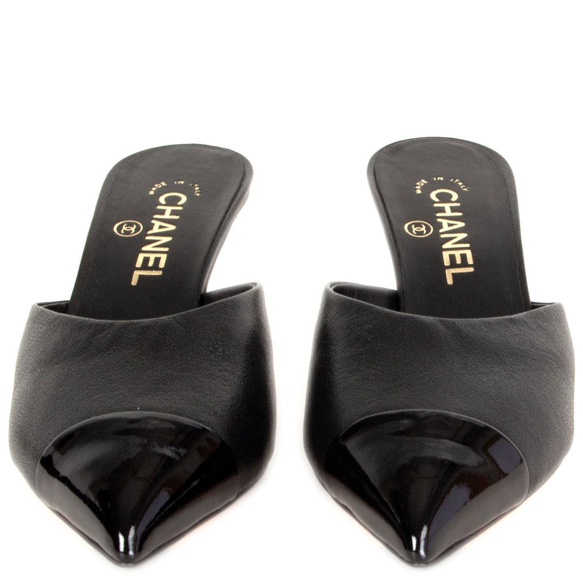 100% authentic Chanel kitten-heel pointed-toe mules in black leather with a patent leather tip featuring faux pearl detail on the heel. Brand new. Come with dust bag. 

Measurements
Imprinted Size	38.5
Shoe Size	38.5
Inside Sole	25cm
