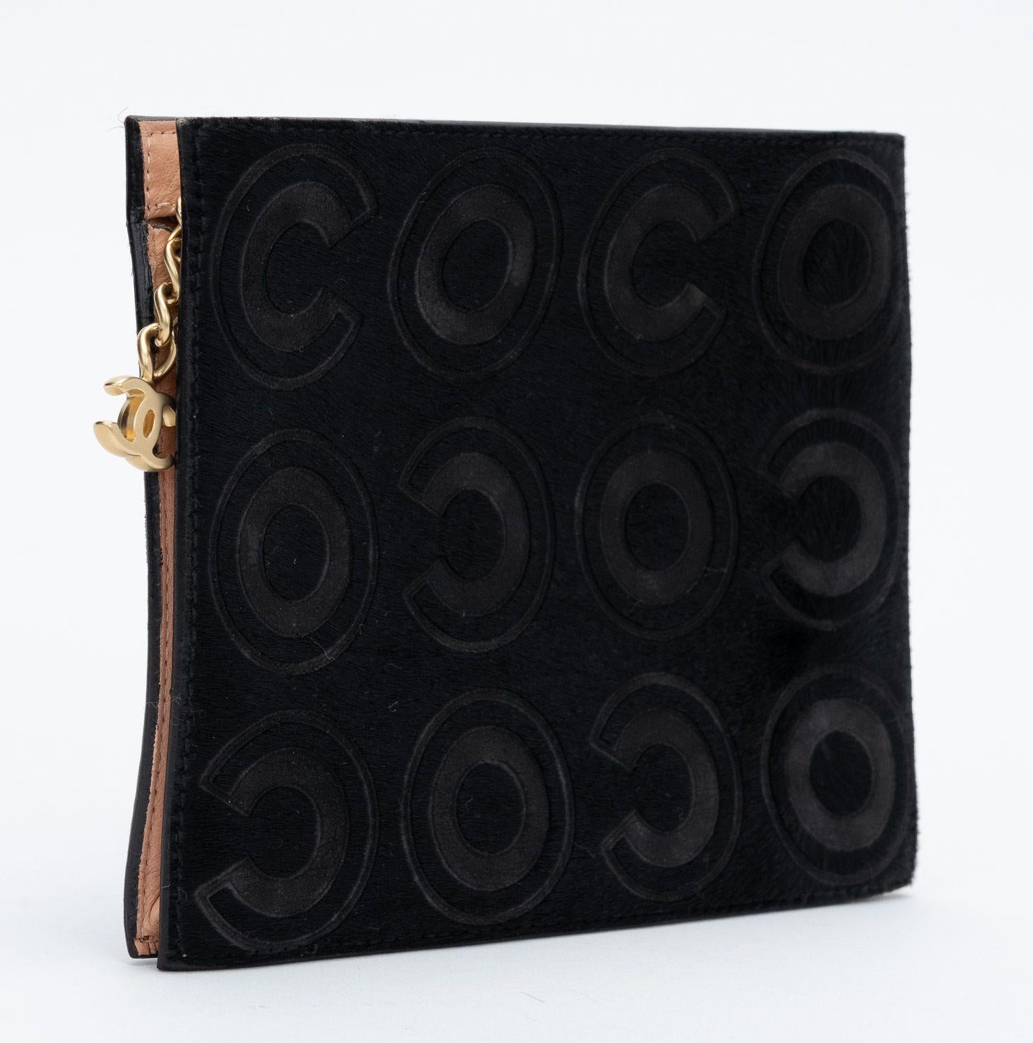 Chanel black pony hair coco pouch.Pink leather lining.
Made in Italy. Collection 6. Comes with hologram and original dust cover.
