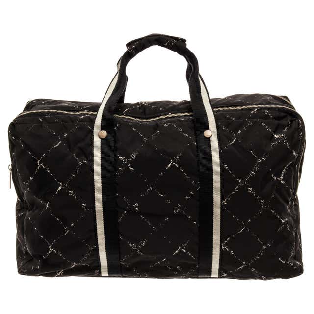 Chanel Vintage White Quilted Leather Black Logo Duffle Bag at 1stDibs ...