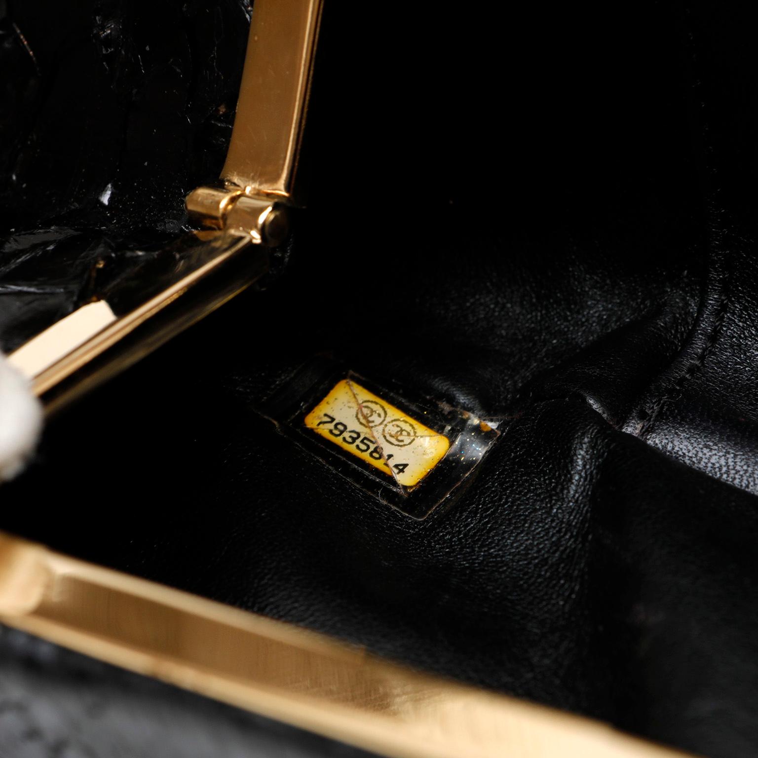 Nero Pochette Chanel in pitone nero in vendita