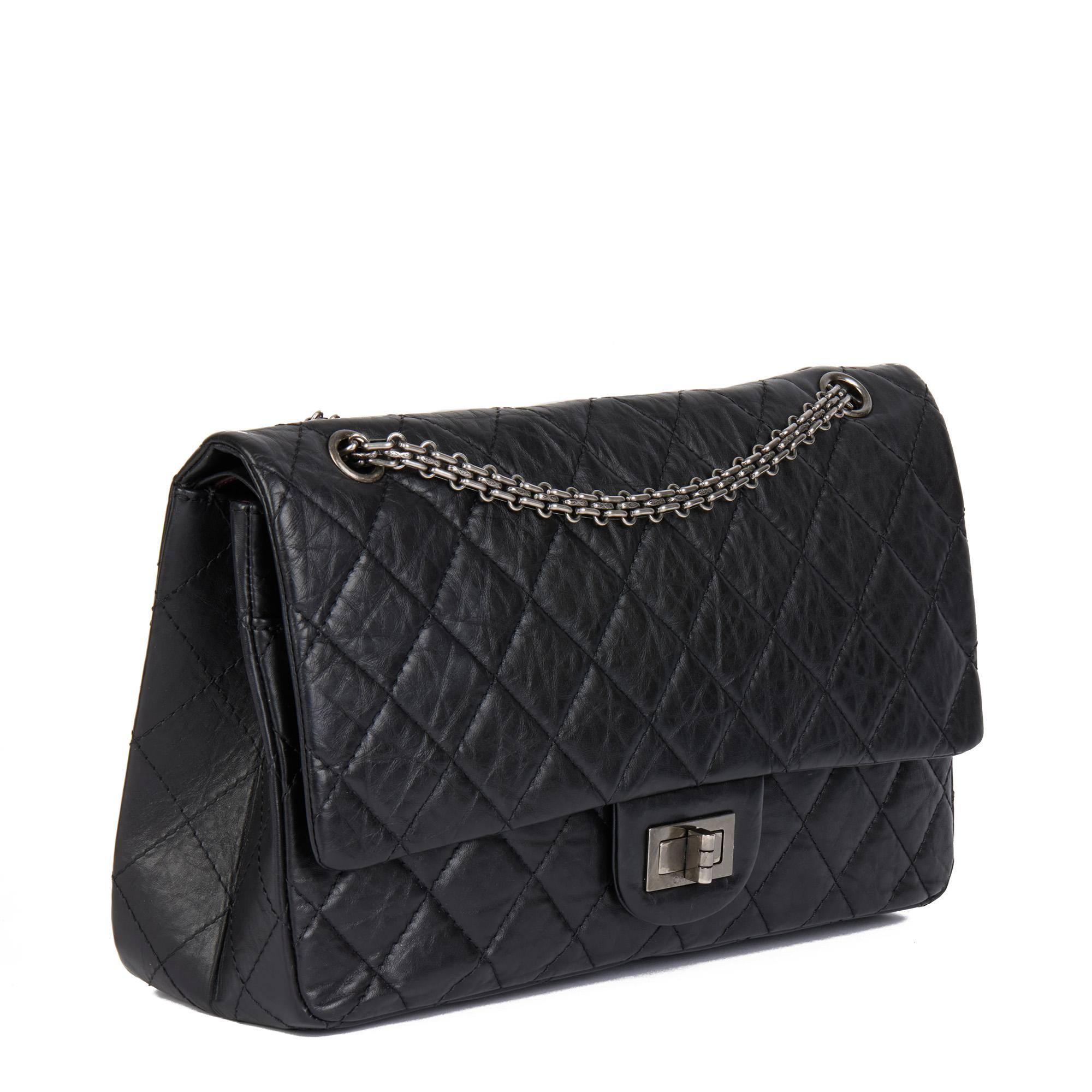 CHANEL
Black Quilted Aged Calfskin leather 2.55 Reissue 227 Double Flap Bag

Xupes Reference: CB608
Serial Number: 14293978
Age (Circa): 2011
Accompanied By: Chanel Dust Bag, Authenticity Card 
Authenticity Details: Serial Sticker (Made in