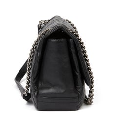 Chanel Black Quilted Aged Calfskin Leather Jumbo Lady Pearly Flap Bag
