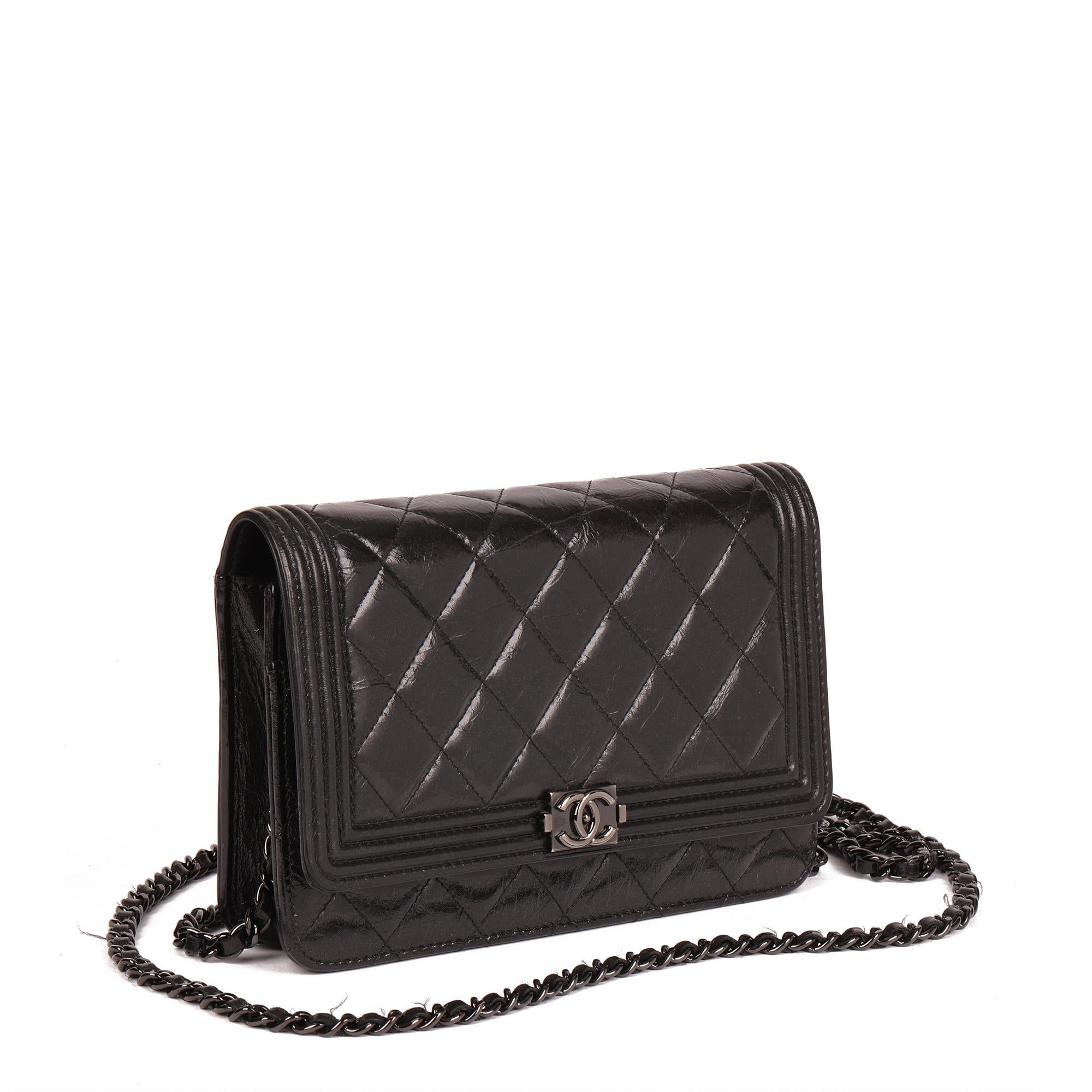CHANEL
Black Quilted Aged Calfskin Leather SO Black Le Boy Wallet-on-Chain WOC

Xupes Reference: HB4623
Serial Number: 19807351
Age (Circa): 2014
Accompanied By: Chanel Dust Bag, Authenticity Card
Authenticity Details: Authenticity Card, Serial