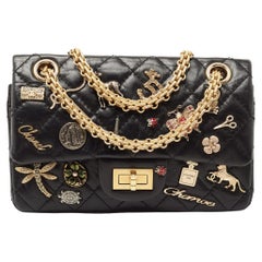Chanel Black Quilted Aged Leather Lucky Charms Reissue 2.55 Classic 224 Flap Bag