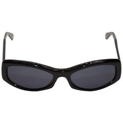 Occhiali da sole Chanel neri con braccio trapuntato