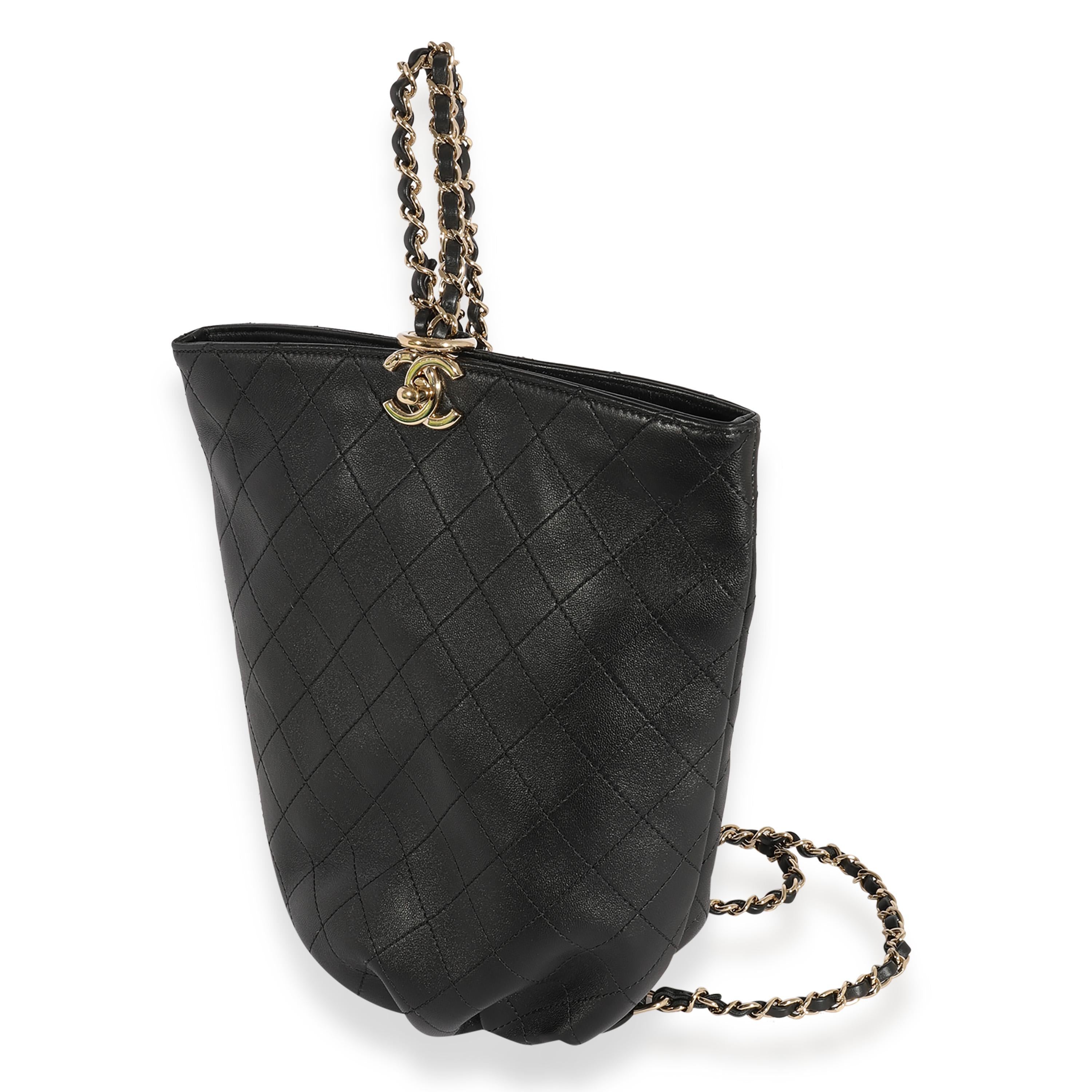 Chanel Black Quilted Calfskin Balloon Bucket Sling Backpack In Excellent Condition In New York, NY