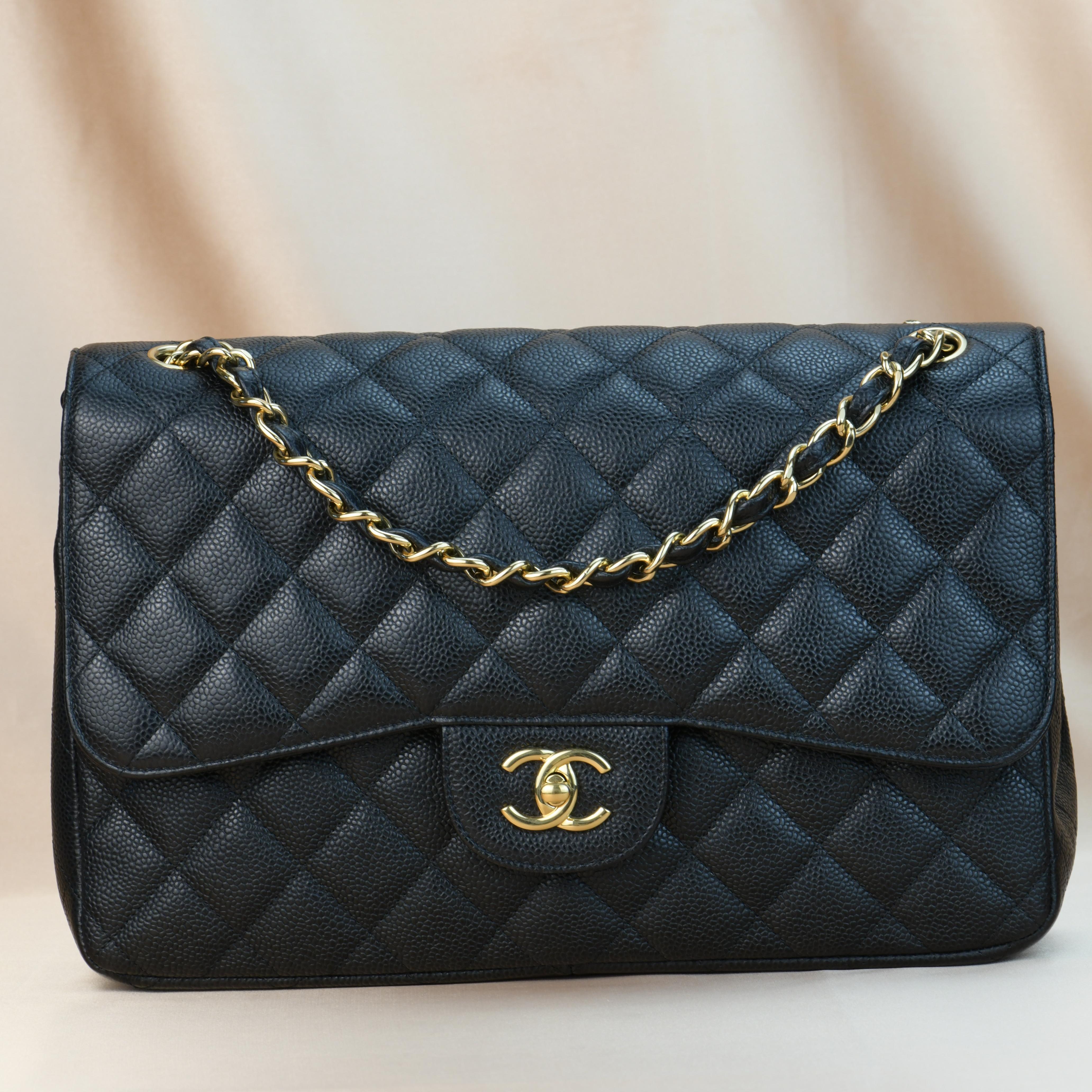 Brand	Chanel
Model	Timeless Classic Double Flap 
Serial No.	15******
Color	Black
Date	Approx. 2012
Metal	Gold
Material	Calfskin Caviar Leather
Measurements	Approx. 11.8in  x 7.9in  x 3.9in 
Condition	Excellent 
Comes with	Chanel Dust bag / authentic