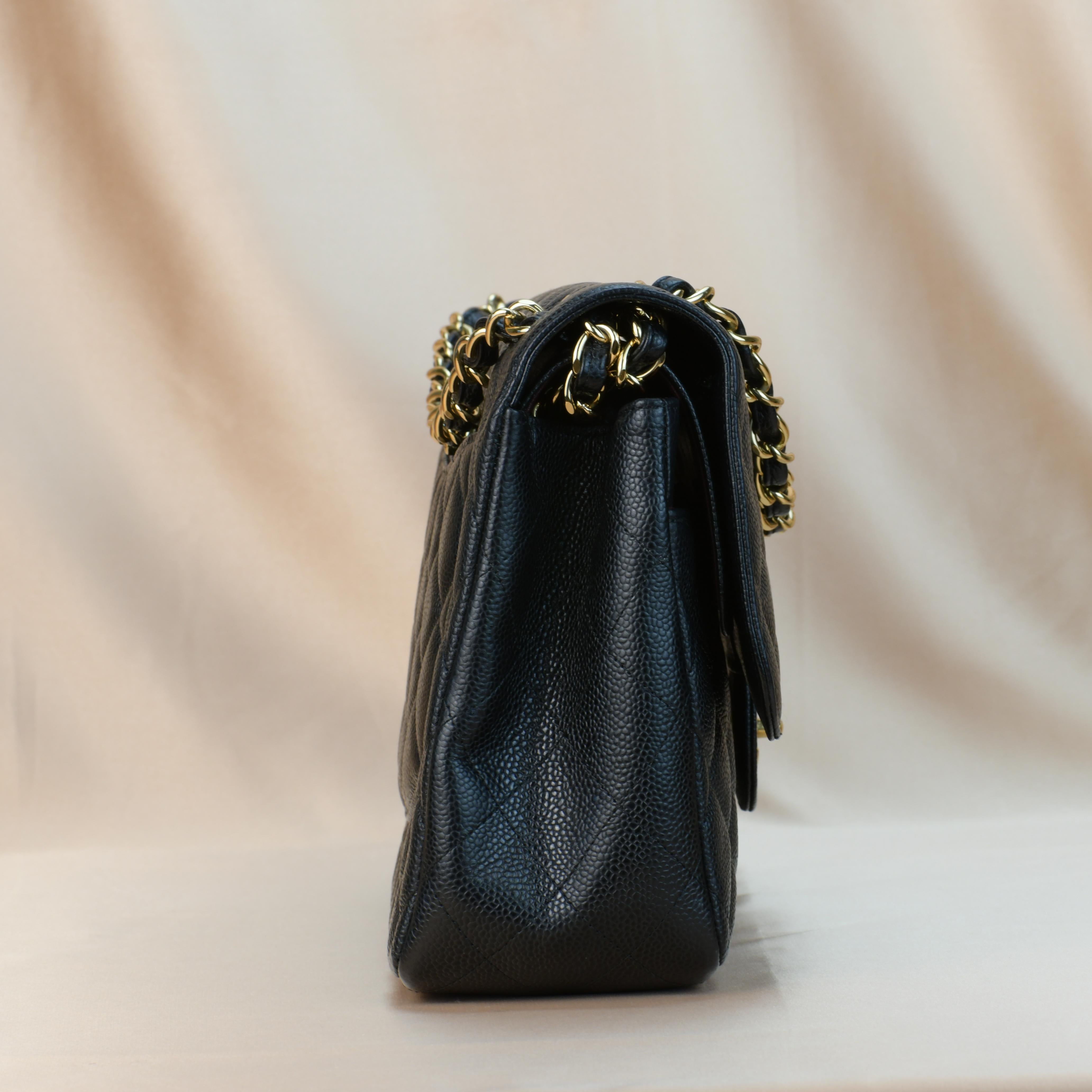 CHANEL Black Quilted Calfskin Caviar Timeless Classic Jumbo Double Flap Bag 1