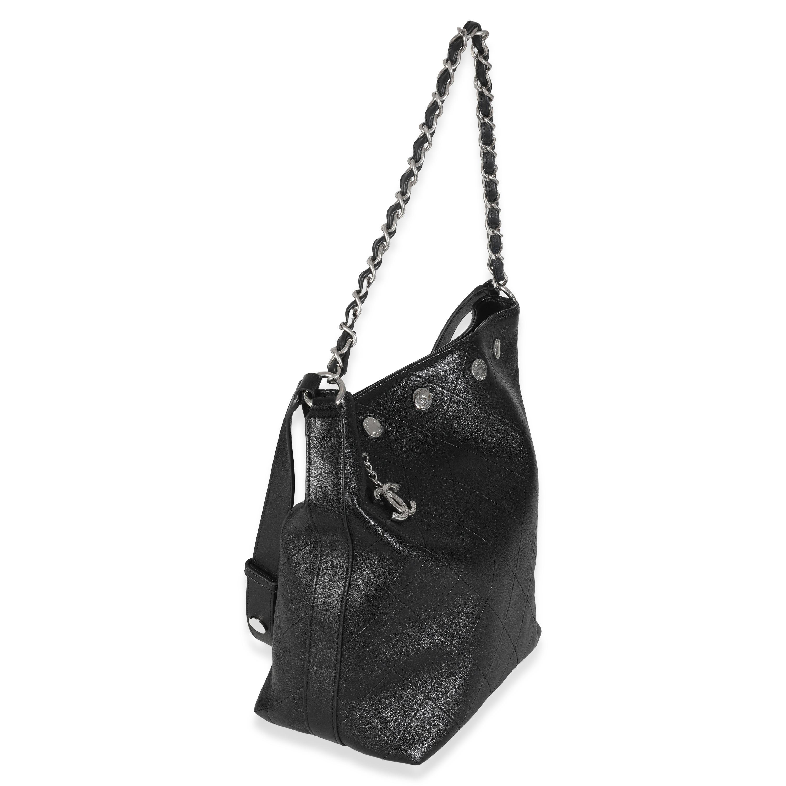 Listing Title: Chanel Black Quilted Calfskin CC Large Button Bucket Bag
SKU: Z146707
MSRP: 7000.00 USD
Condition: Pre-owned 
Handbag Condition: Excellent
Condition Comments: Item is in excellent condition and displays light signs of wear. Light