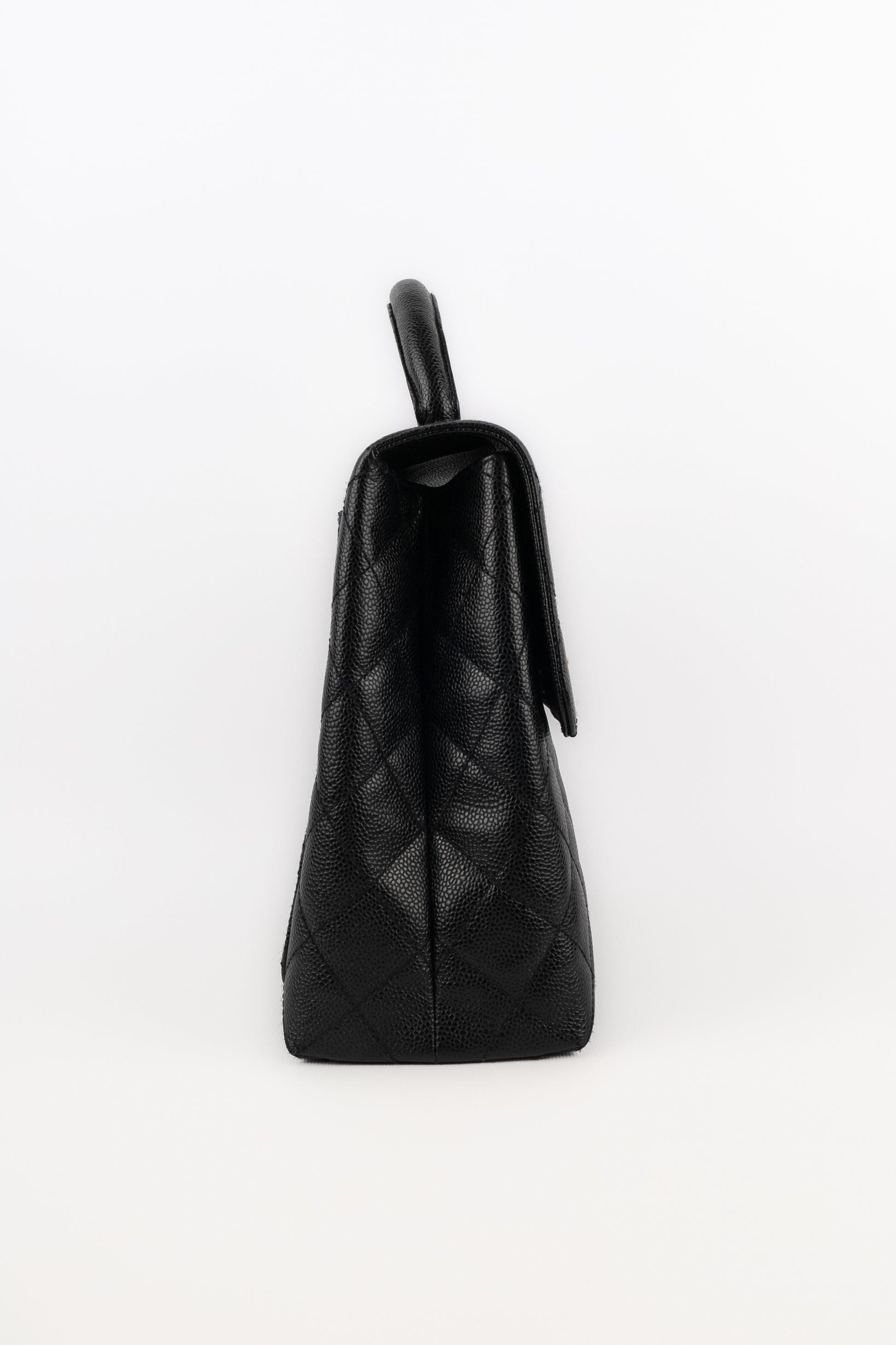 Chanel Black Quilted Caviar Calfskin Handbag, 2002/2003 For Sale 1