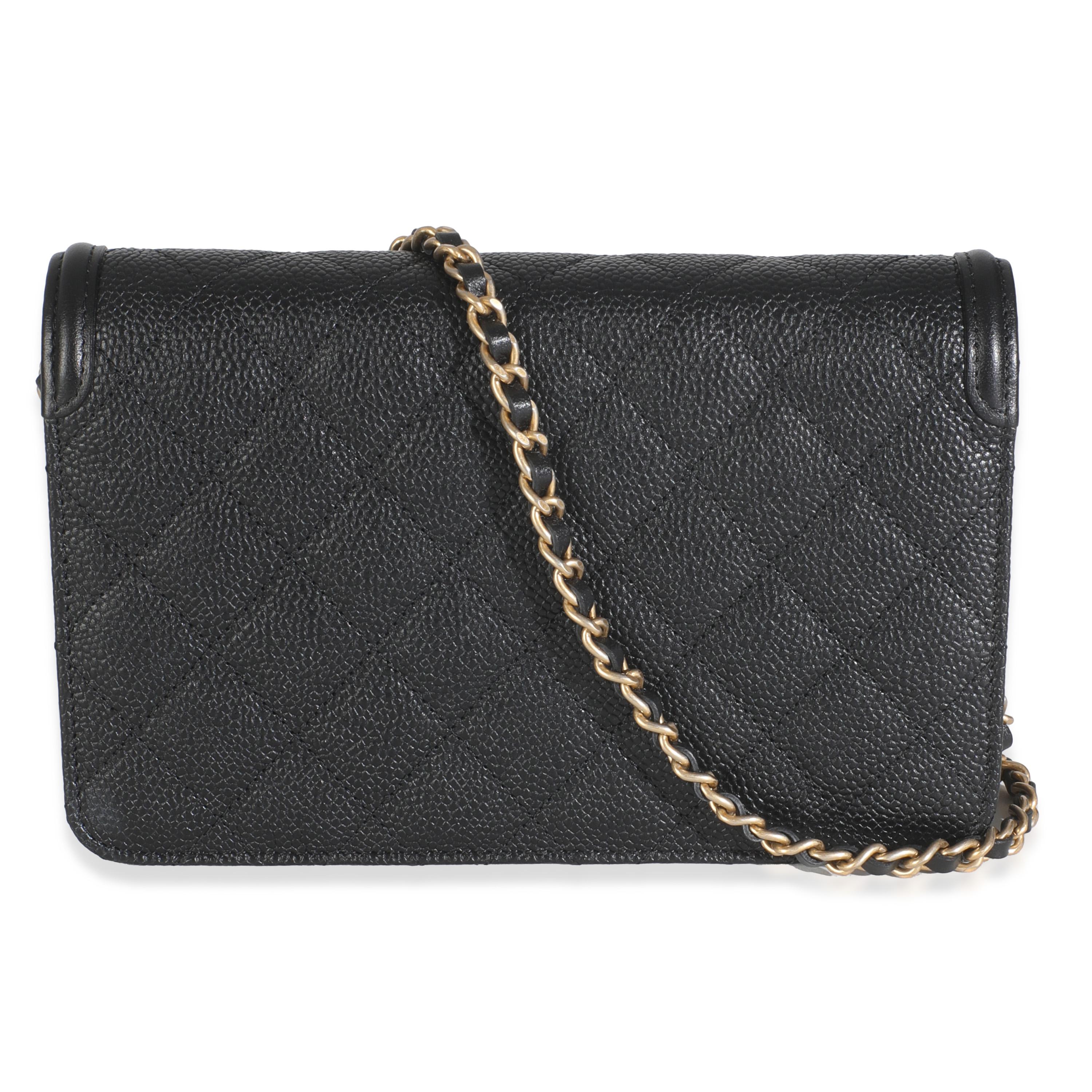 Listing Title: Chanel Black Quilted Caviar Filigree Wallet On Chain
SKU: 145855
Condition: Pre-owned 
Handbag Condition: Excellent
Condition Comments: Item is in excellent condition and displays light signs of wear. Faint wear along interior. Minor