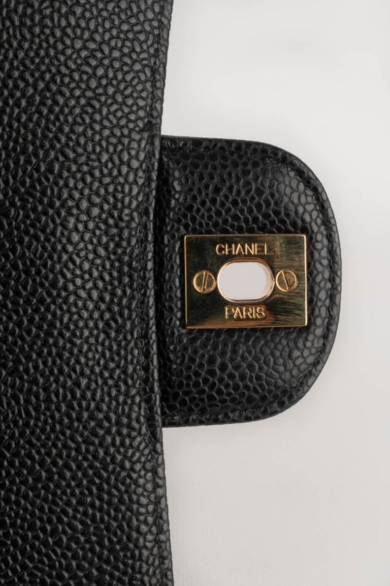 Chanel Sac Classic en cuir de veau grainé noir caviar matelassé, 2011 4