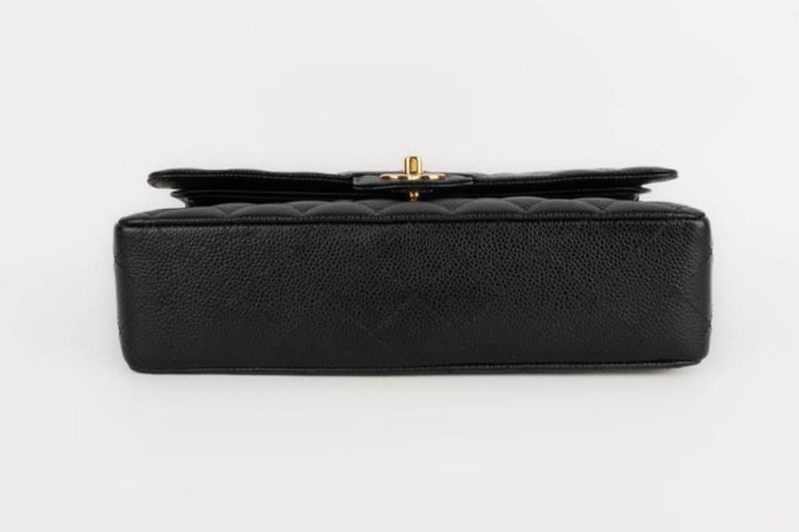  Chanel Sac Classic en cuir de veau grainé noir caviar matelassé, 2011 Pour femmes 