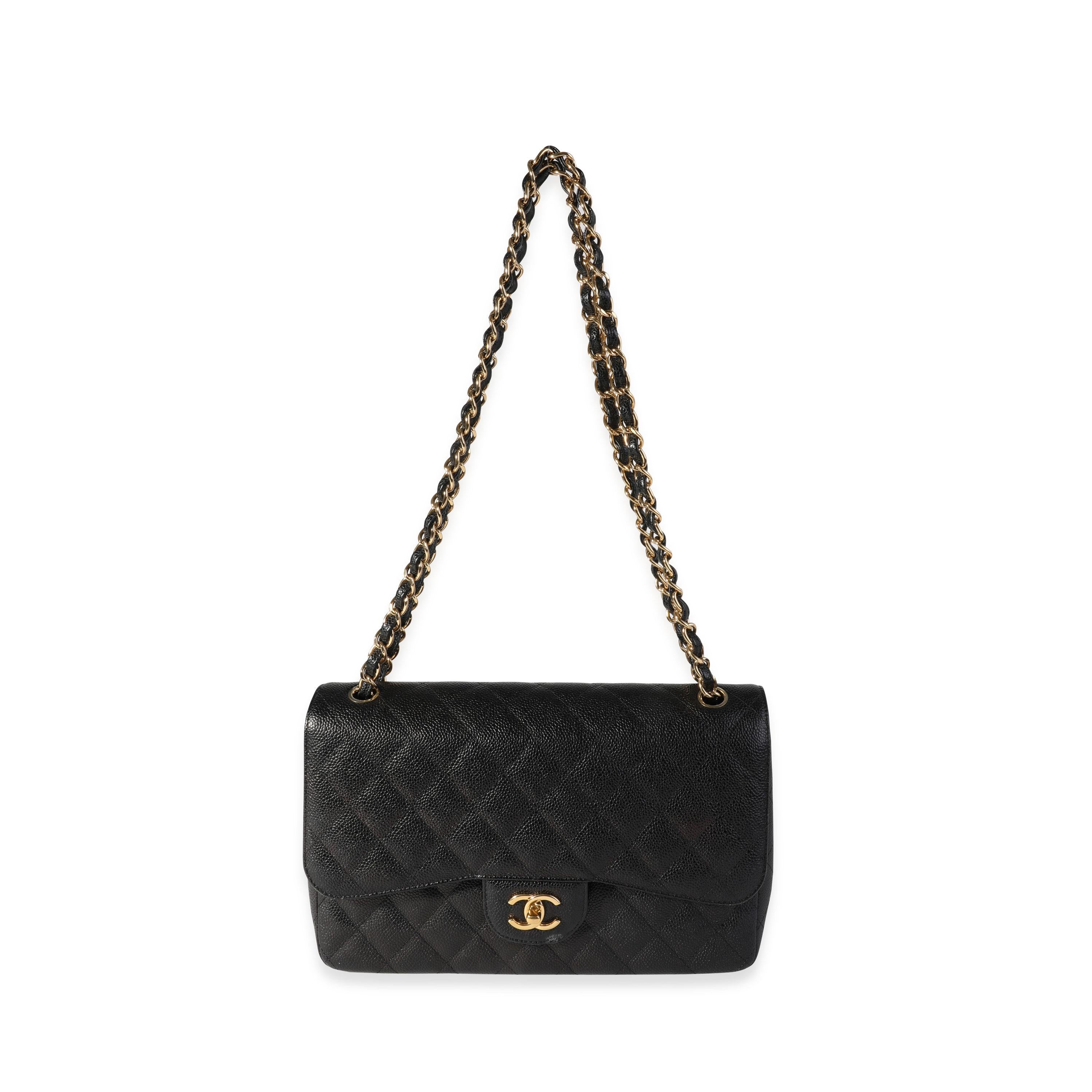 Listing Title: Chanel Black Quilted Caviar Jumbo Classic Double Flap Bag
SKU: 118540
MSRP: 9500.00

Handbag Condition: Very Good
Condition Comments: Very Good Condition. Scuffing to corners and flap. Scratching and tarnishing to hardware. Scuffing