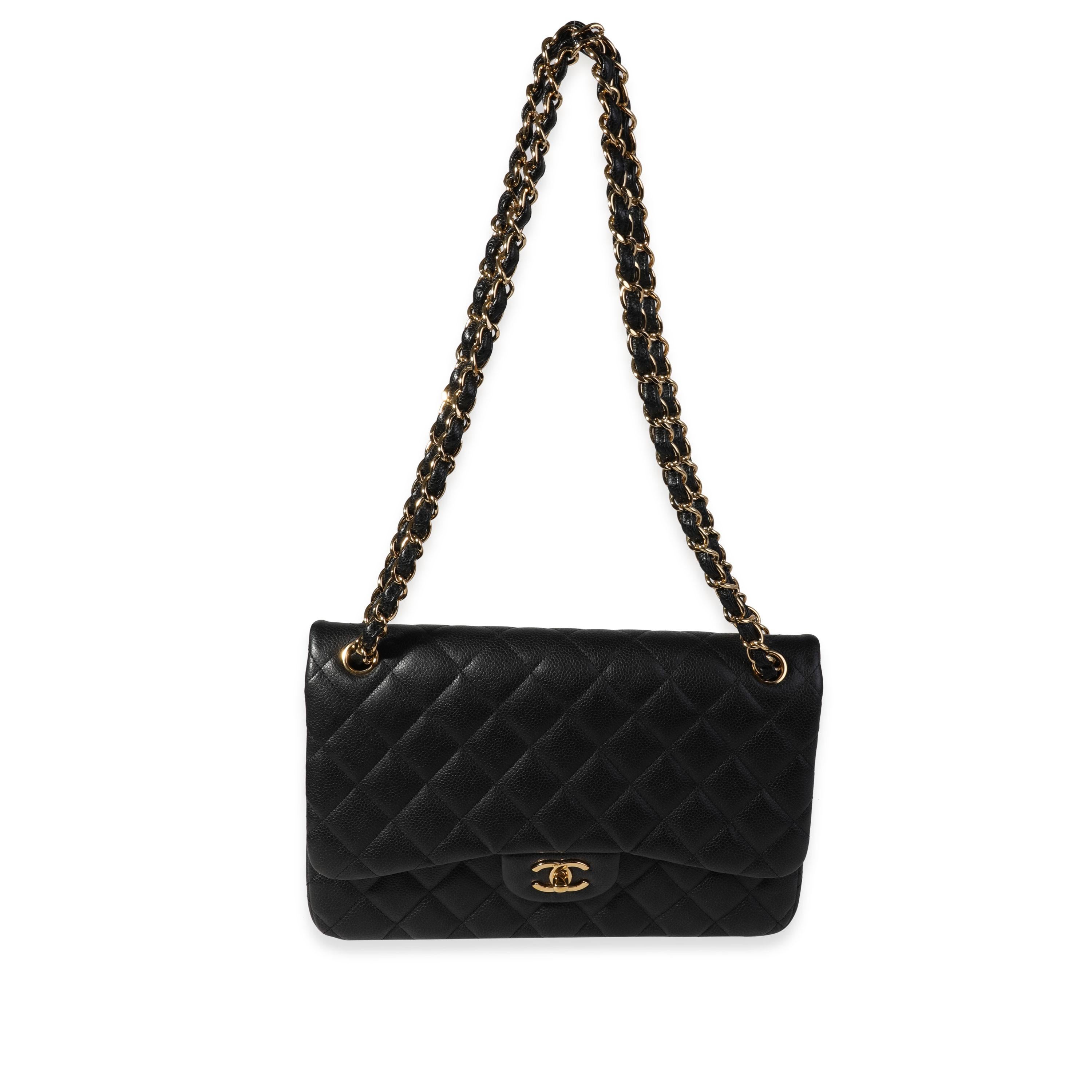Listing Title: Chanel Black Quilted Caviar Jumbo Classic Double Flap Bag
SKU: 120153
MSRP: 9500.00

Handbag Condition: Very Good
Condition Comments: Wear to corners. Scratches on hardware.
Brand: Chanel
Model: Classic Double Flap
Origin Country: