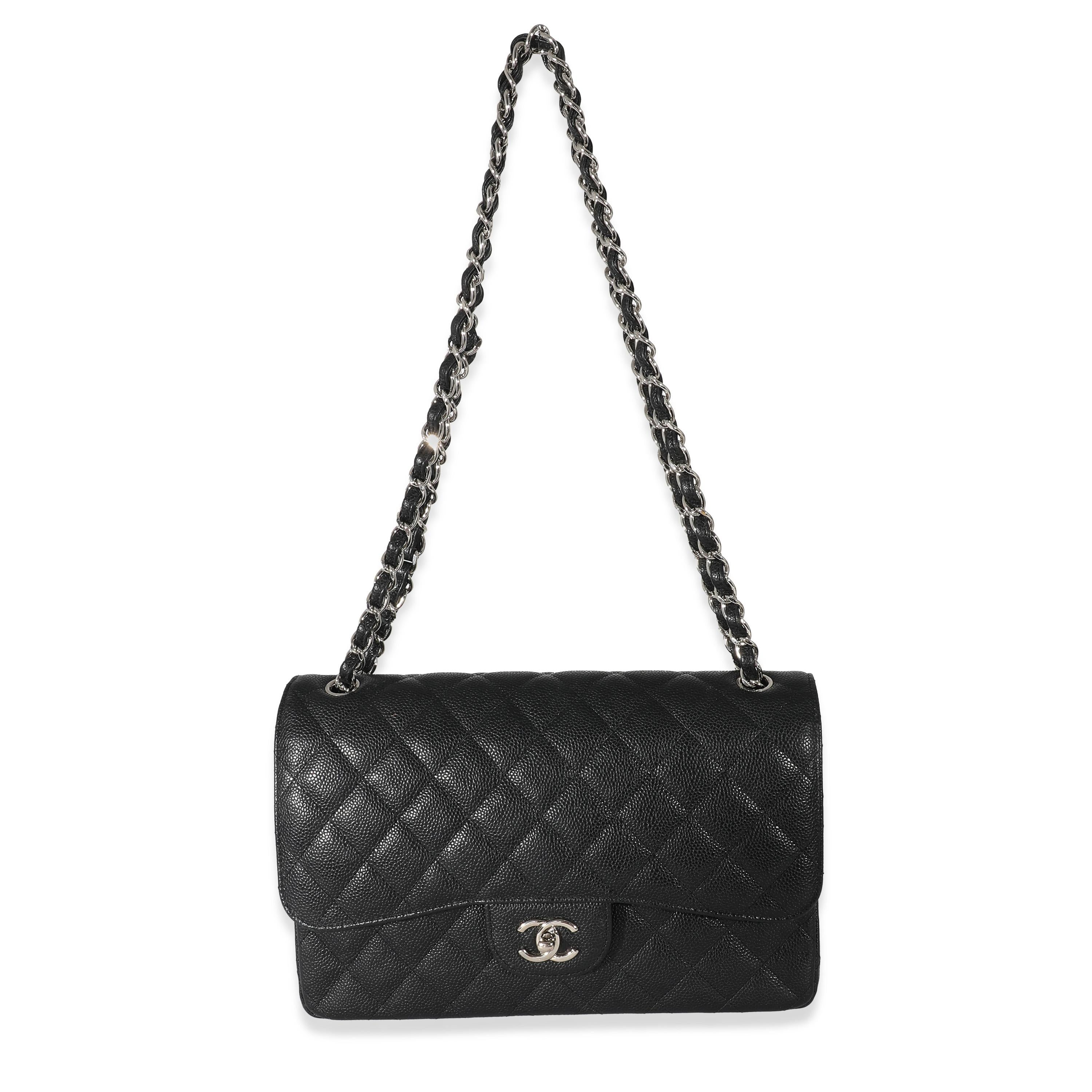 Listing Title: Chanel Black Quilted Caviar Jumbo Double Flap Bag
SKU: 133219
Condition: Pre-owned 
Handbag Condition: Very Good
Condition Comments: Item is in very good condition with minor signs of wear. Exterior scuffing and marks throughout.