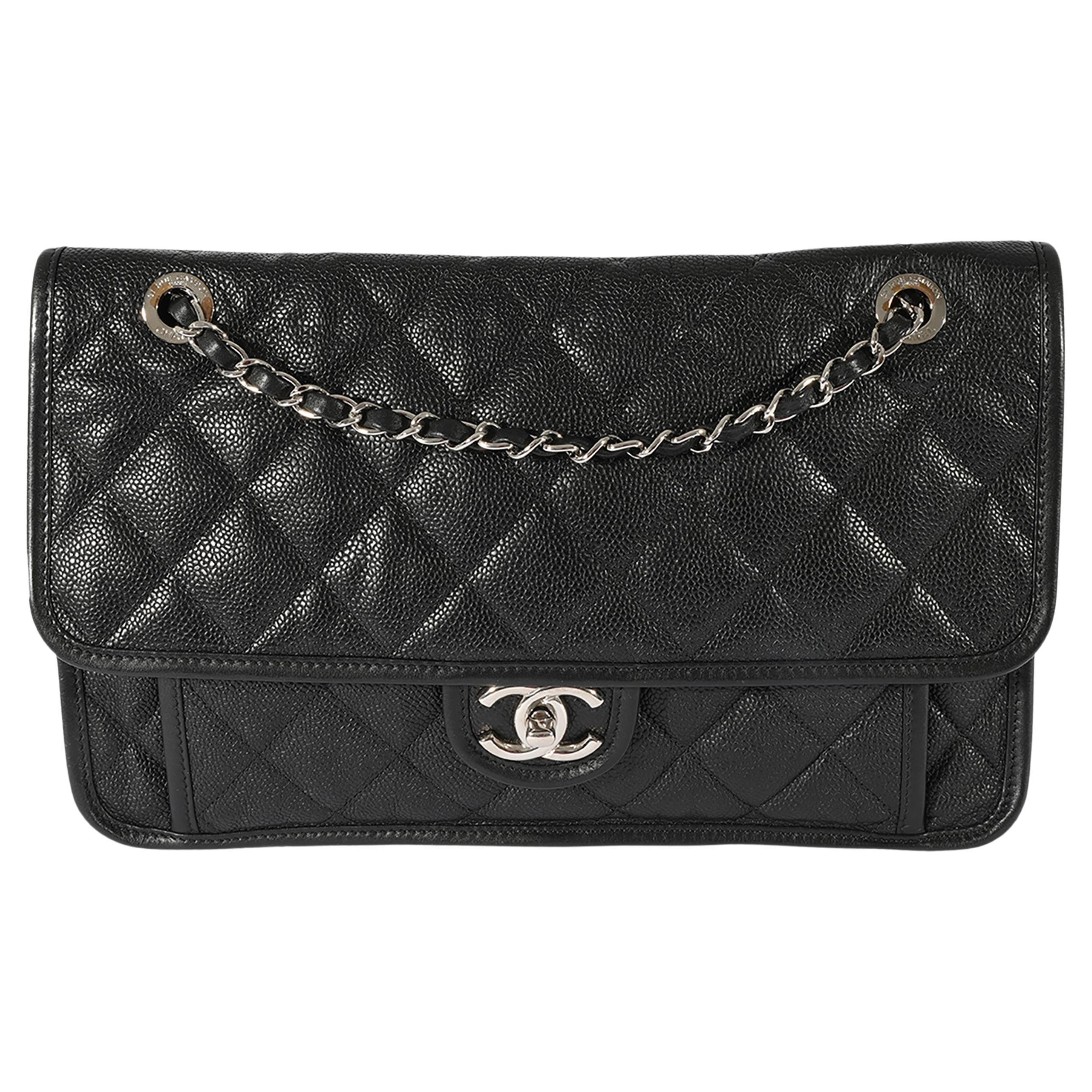 Chanel grand sac à rabat Caviar noir matelassé de la Côte d
Azur
