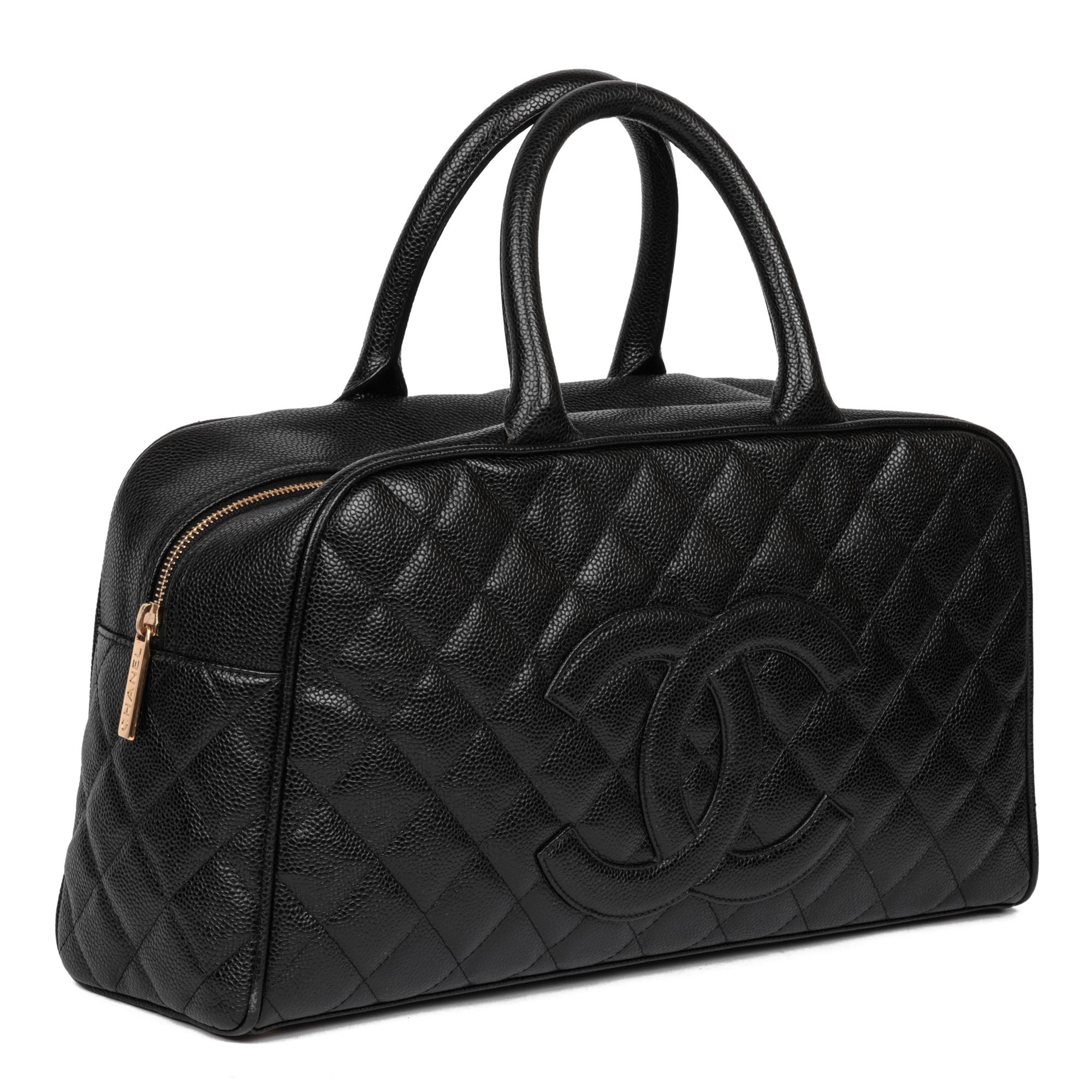 CHANEL
Black Quilted Caviar Leather Boston Bag

Xupes Reference: HB5140
Serial Number: 9401457
Age (Circa): 2005
Accompanied By: Chanel Dust Bag
Authenticity Details: Date Stamp (Made in Italy)
Gender: Ladies
Type: Tote

Colour: Black
Hardware: