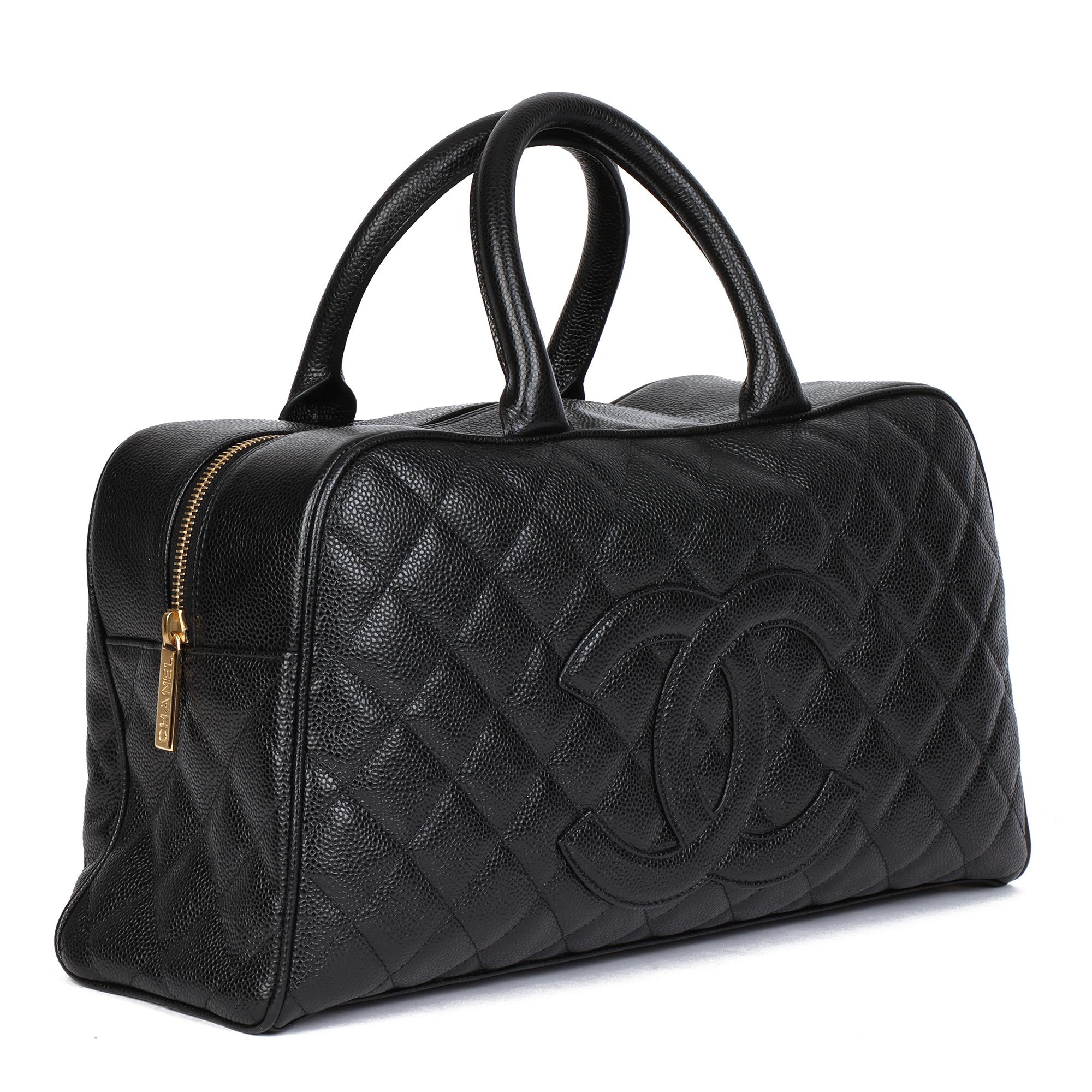 CHANEL
Black Quilted Caviar Leather Boston

Xupes Reference: HB4545
Serial Number: 8538369
Age (Circa): 2003
Accompanied By: Chanel Dust Bag, Authenticity Card, Care Booklet
Authenticity Details: Authenticity Card, Serial Sticker (Made in