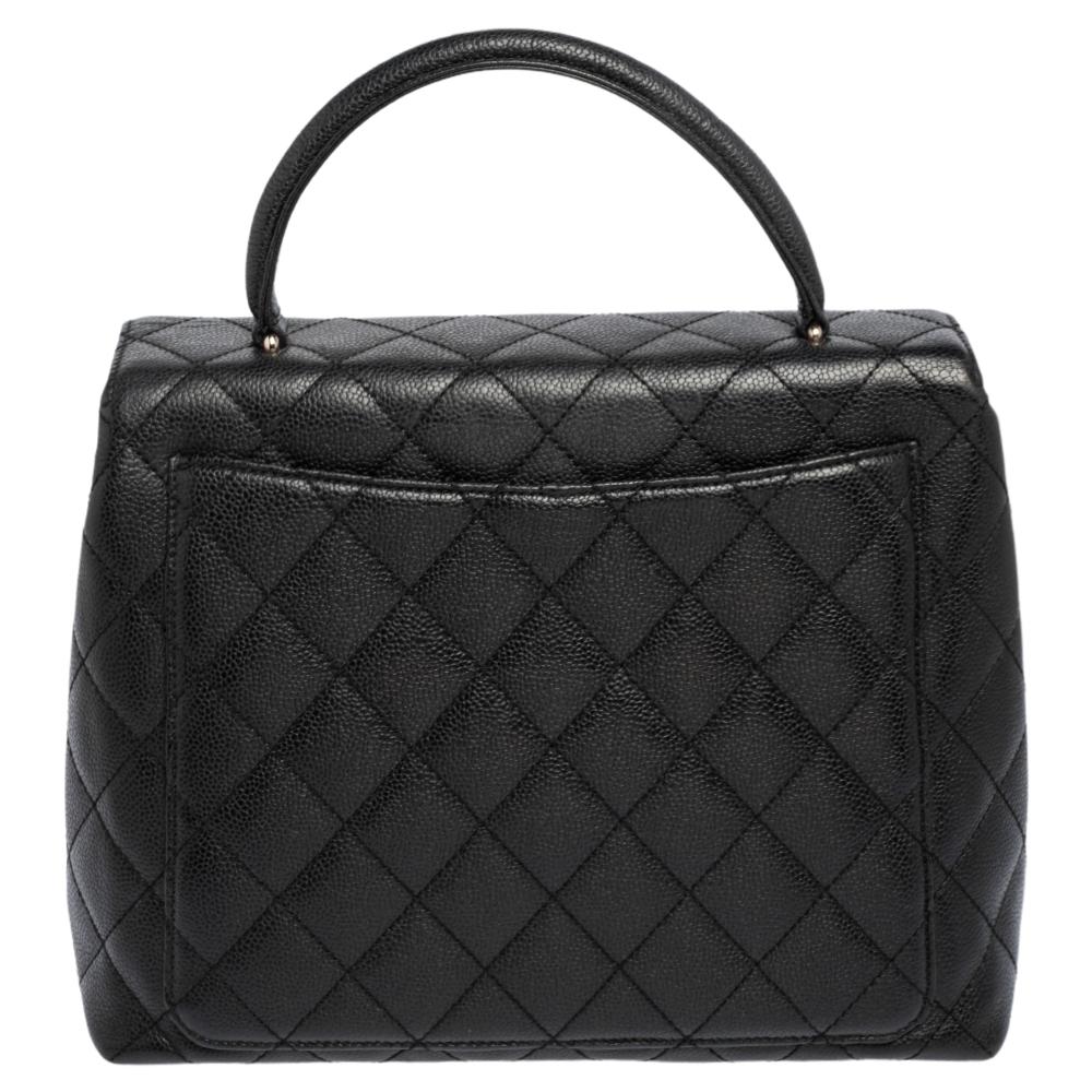 One would possibly trade any other bag for this Trendy CC bag from Chanel. The iconic CC turn-lock in silver-tone hardware lies beautifully on the black quilted exterior crafted from leather. The back of the bag has an easy slip pocket and the