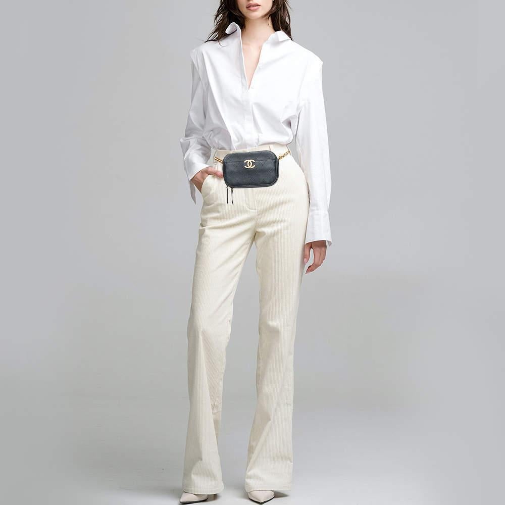 It really does take a few seconds to believe that there could be anything as chic as this waist bag from Chanel The bag is perfect for carrying essentials hands free. It brings along the iconic CC logo on the exterior and a leather chain strap. It