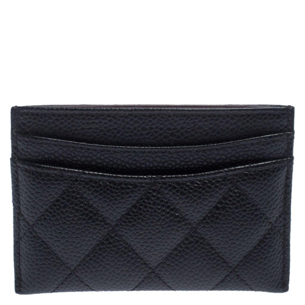 This card holder from Chanel is a perfect combination of sophistication and necessity. Crafted from leather, the sleek black piece has slots to stow your essential cards in place. It flaunts a quilted exterior and is complete with the iconic CC on