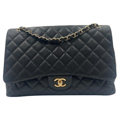 Chanel - Sac classique en cuir caviar matelassé noir 2010