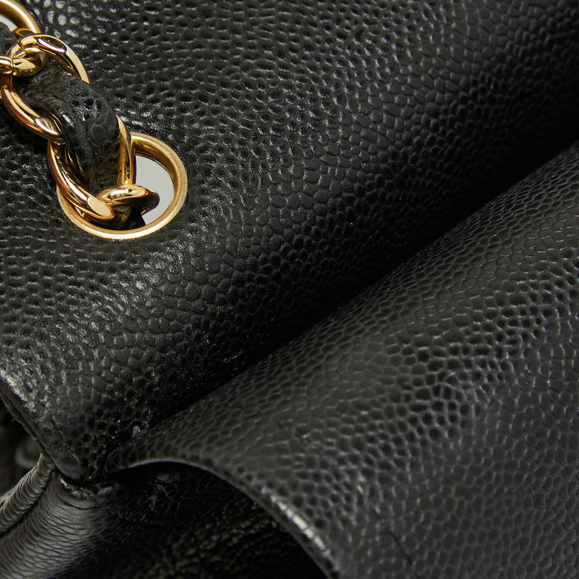 Chanel Schwarze gesteppte Jumbo Classic Double Flap Tasche aus Leder in Kaviar im Angebot 8