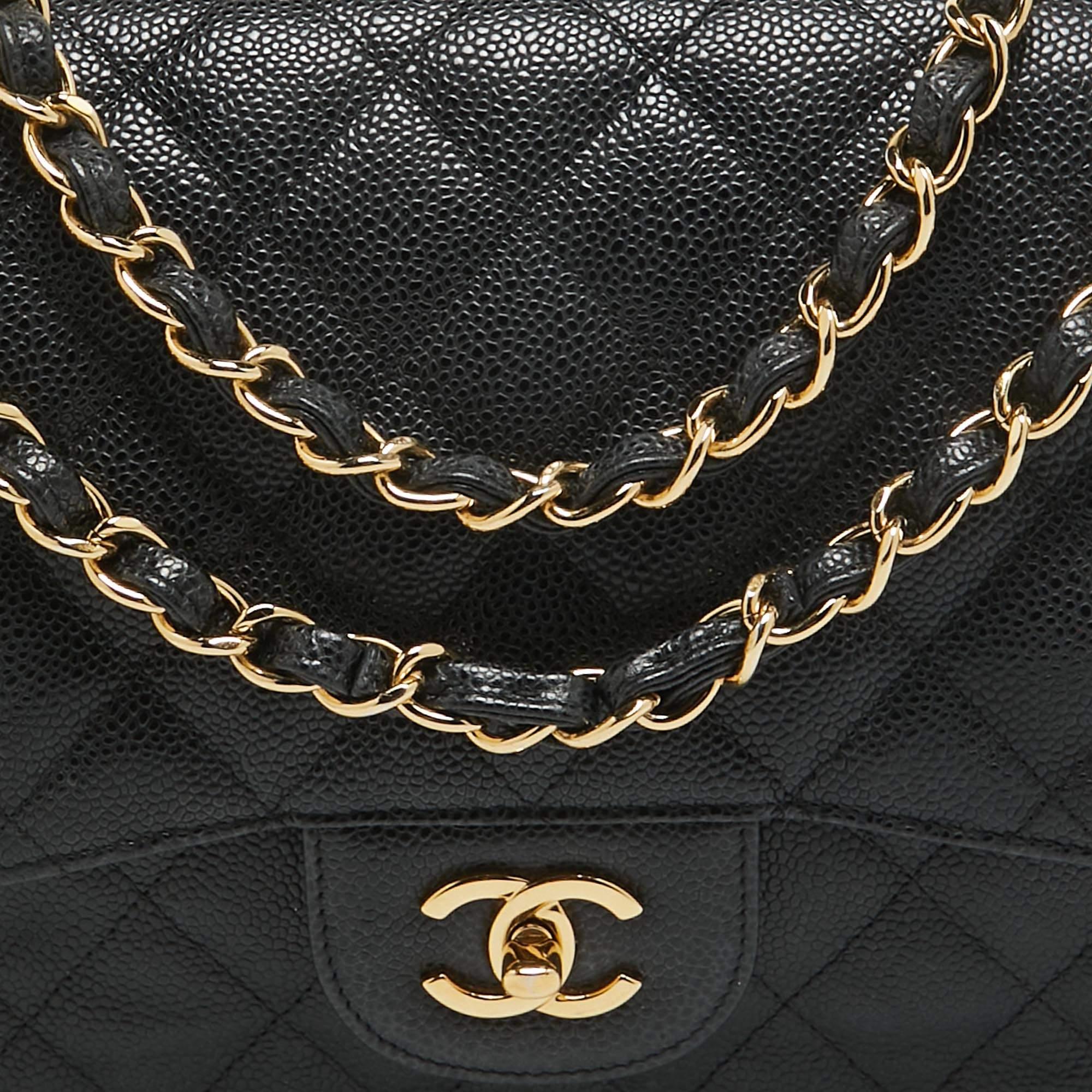 Chanel Schwarze gesteppte Jumbo Classic Double Flap Tasche aus Leder in Kaviar im Angebot 10